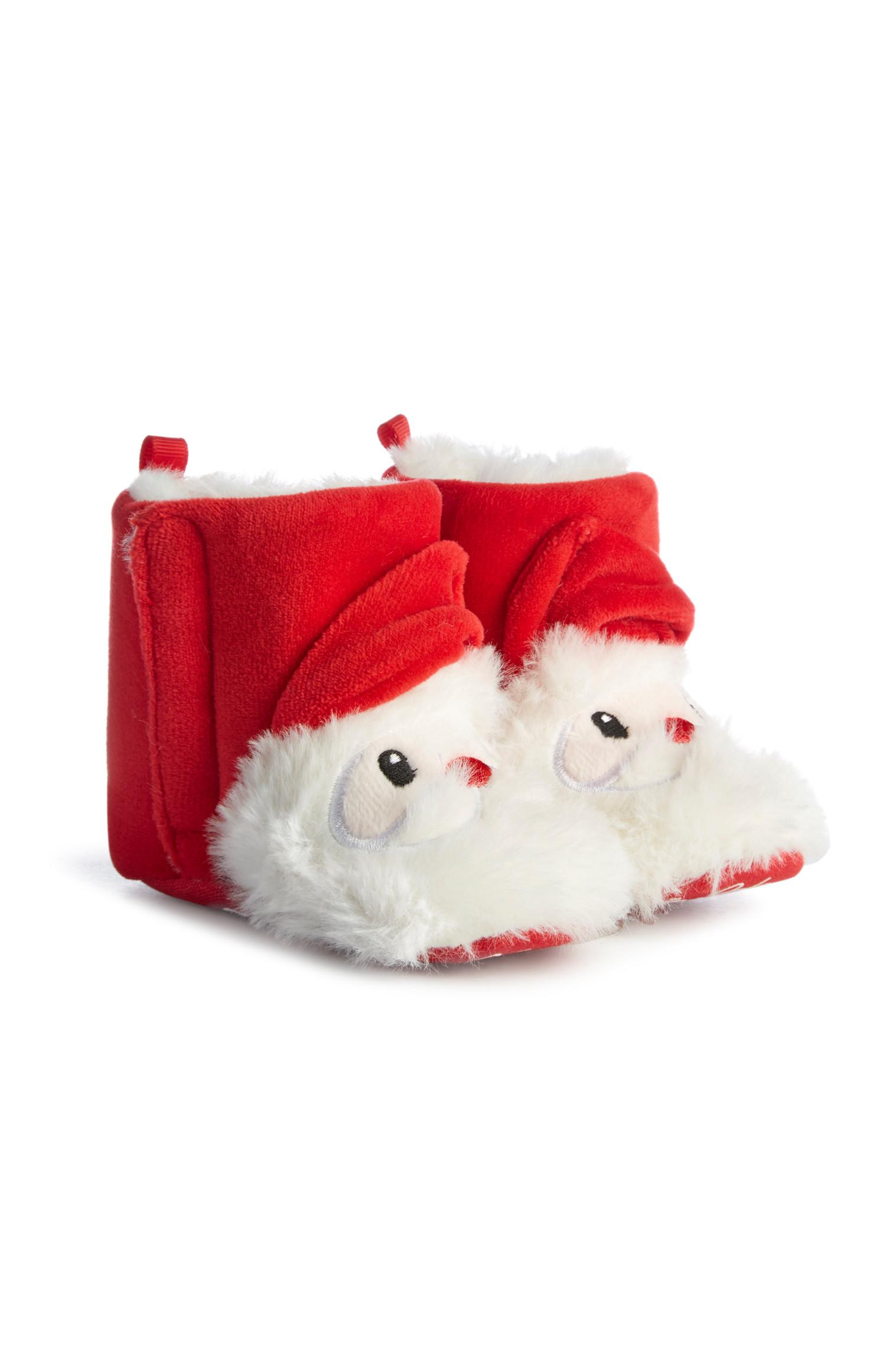 Zapatillas tipo bota rojas de Papá Noel