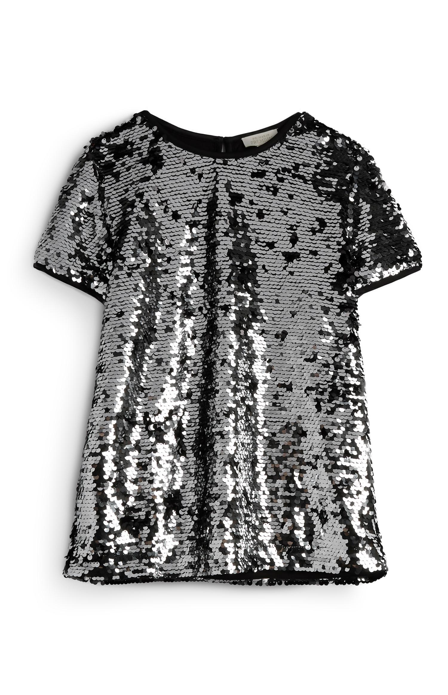 Blusa con lentejuelas plateadas para niña mayor