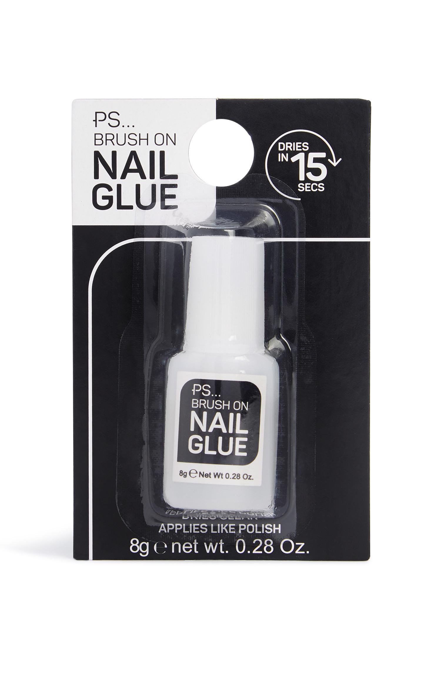 Pegamento de uñas con brocha