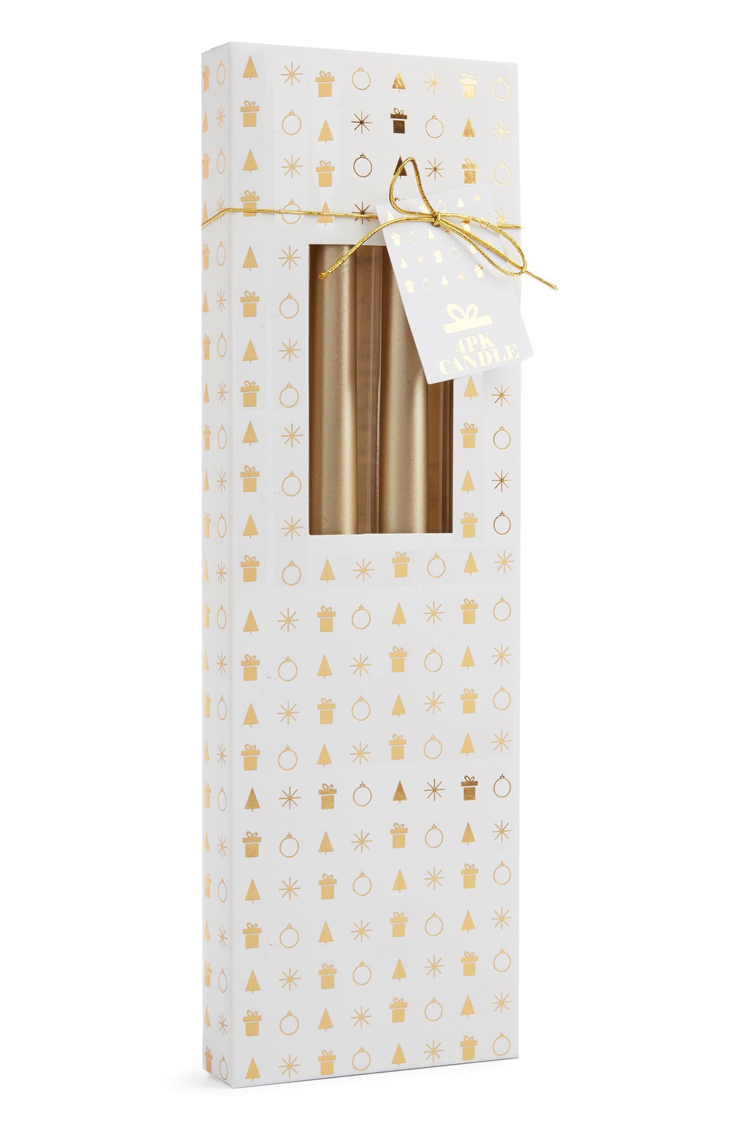 Velas de cena doradas