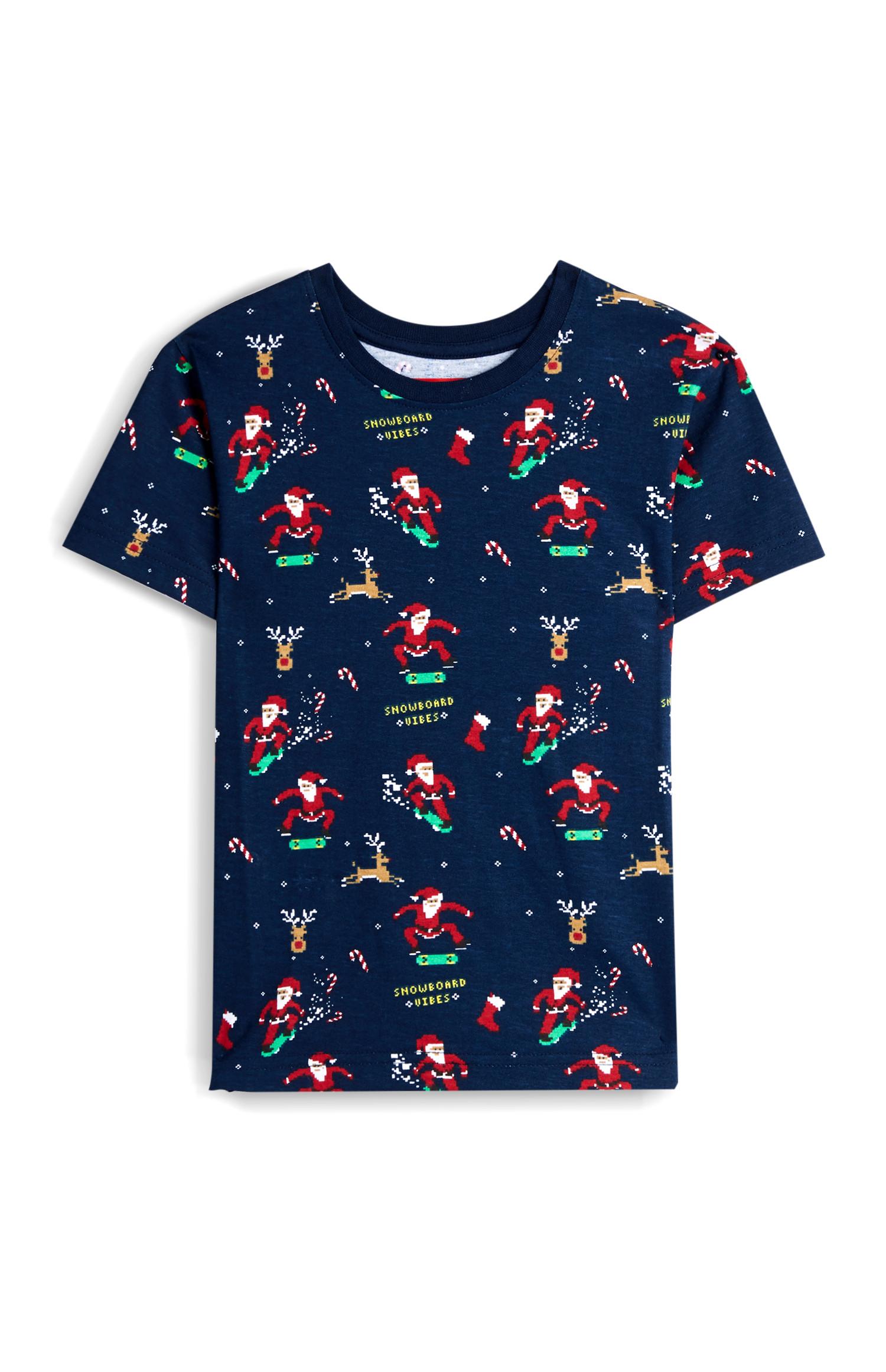 Camiseta azul marino con Papá Noel haciendo snowboard para niño pequeño