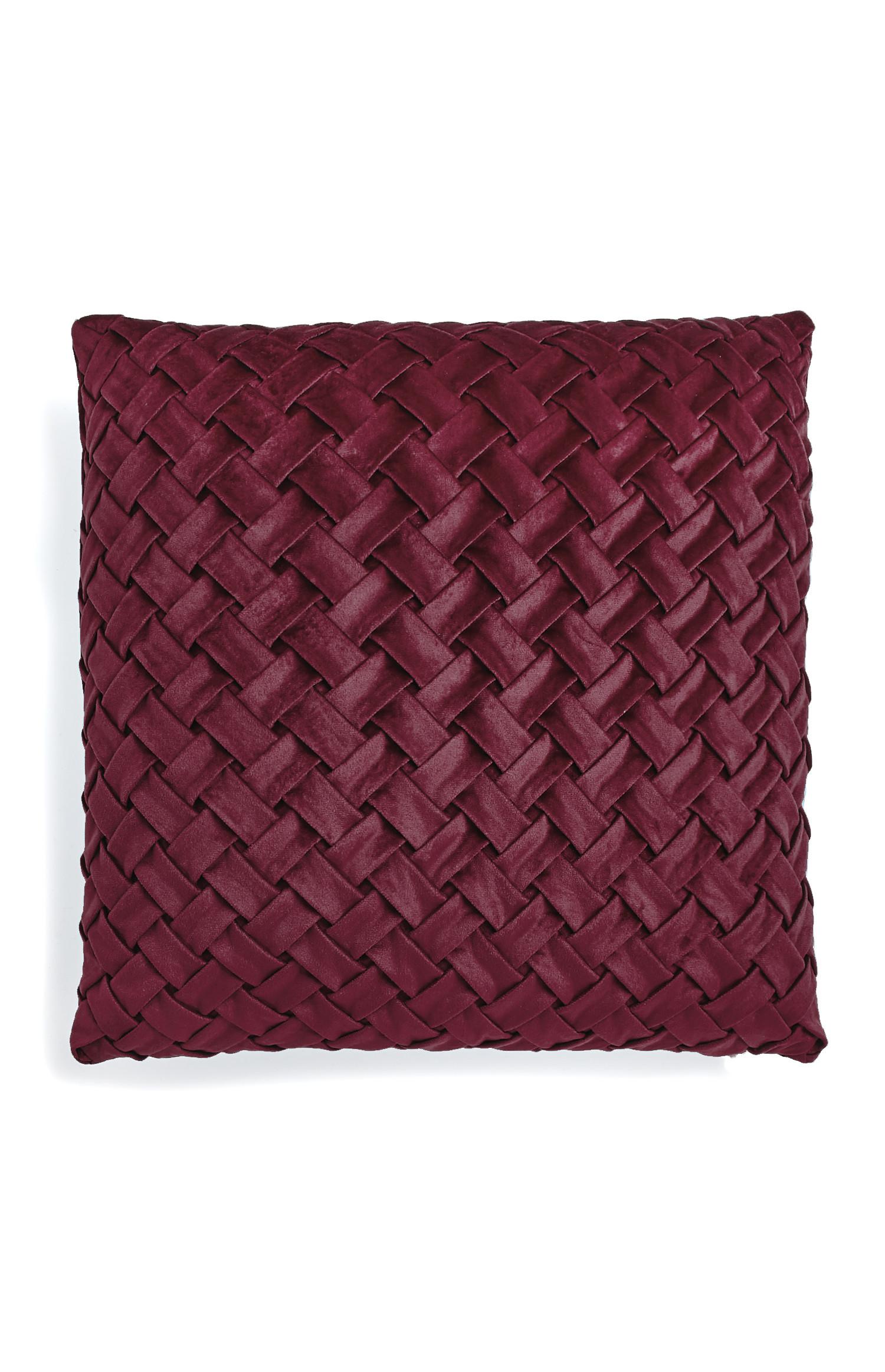Cojín trenzado de terciopelo burdeos