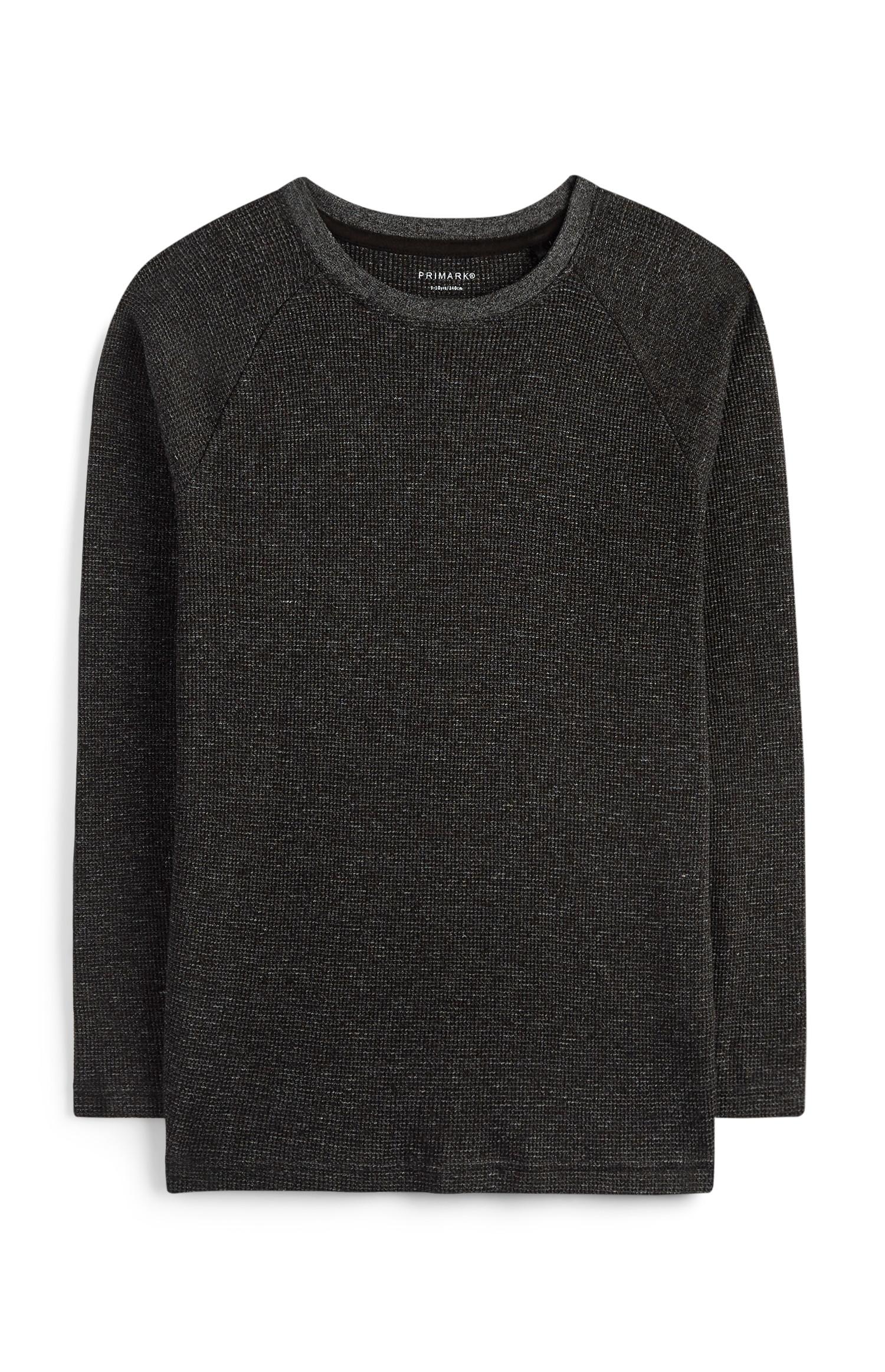 Camiseta negra con textura para niño mayor