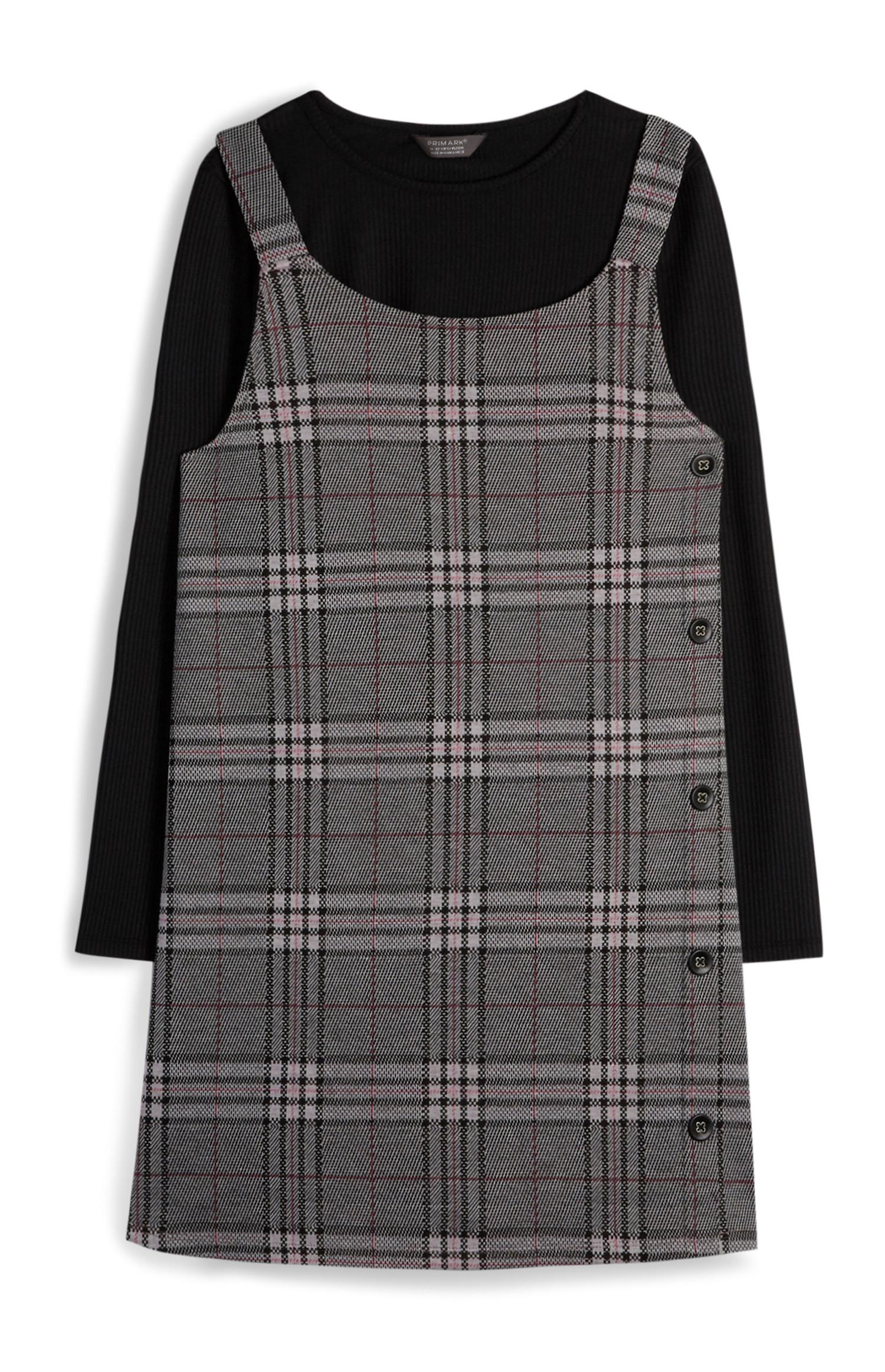 Pichi con botones laterales a cuadros grises con camiseta negra para niña mayor