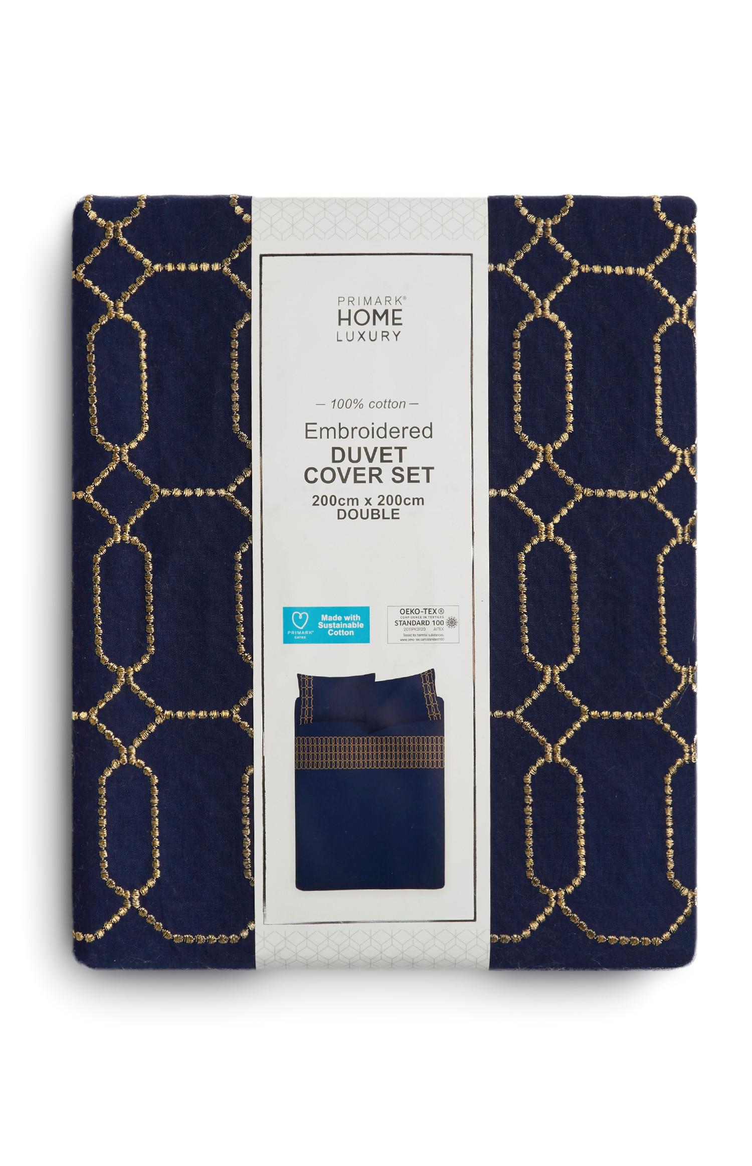 Funda para edredón doble con bordado azul marino y dorado de algodón sostenible