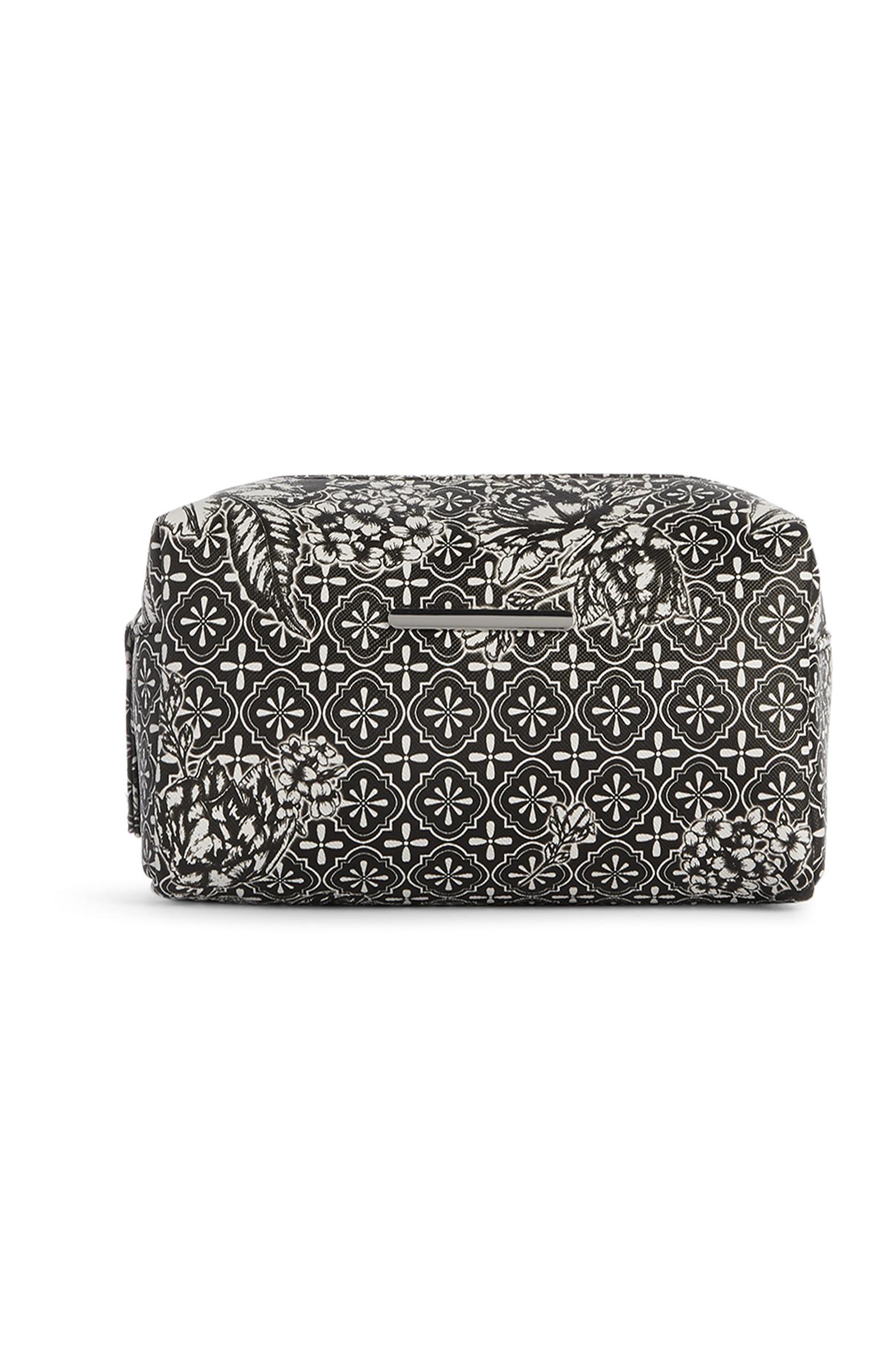 Neceser de maquillaje blanco y negro