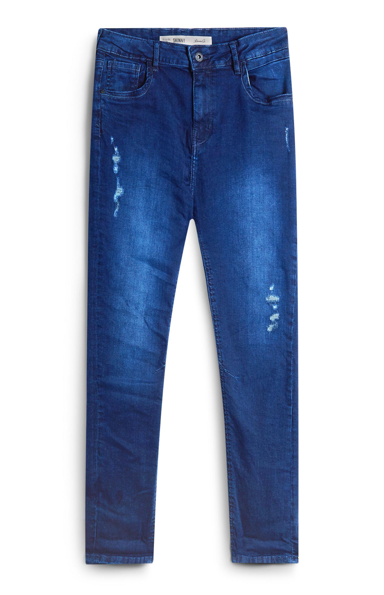 Jeans azzurri con strappi da ragazzo