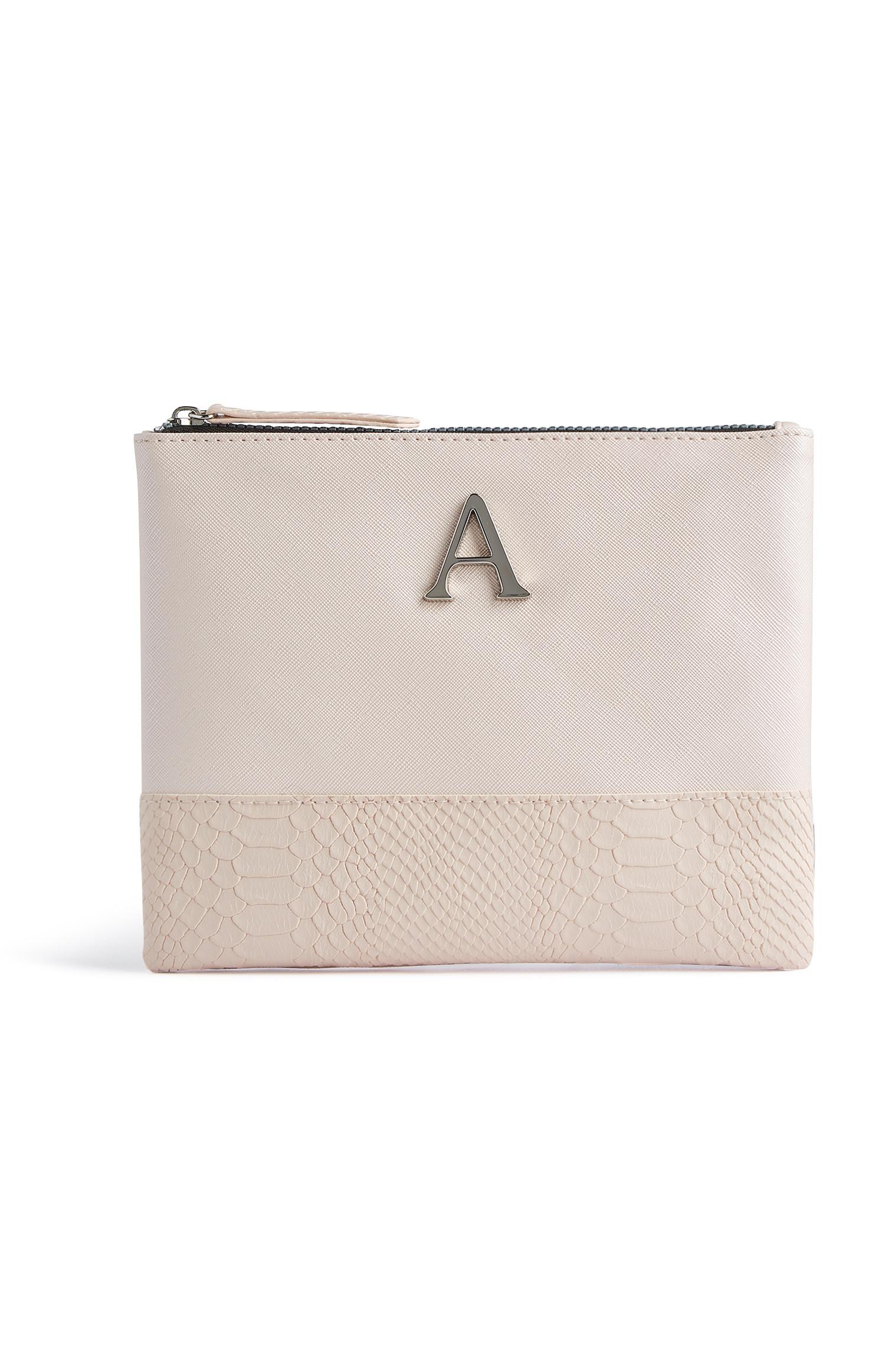 Neceser de maquillaje nude con inicial