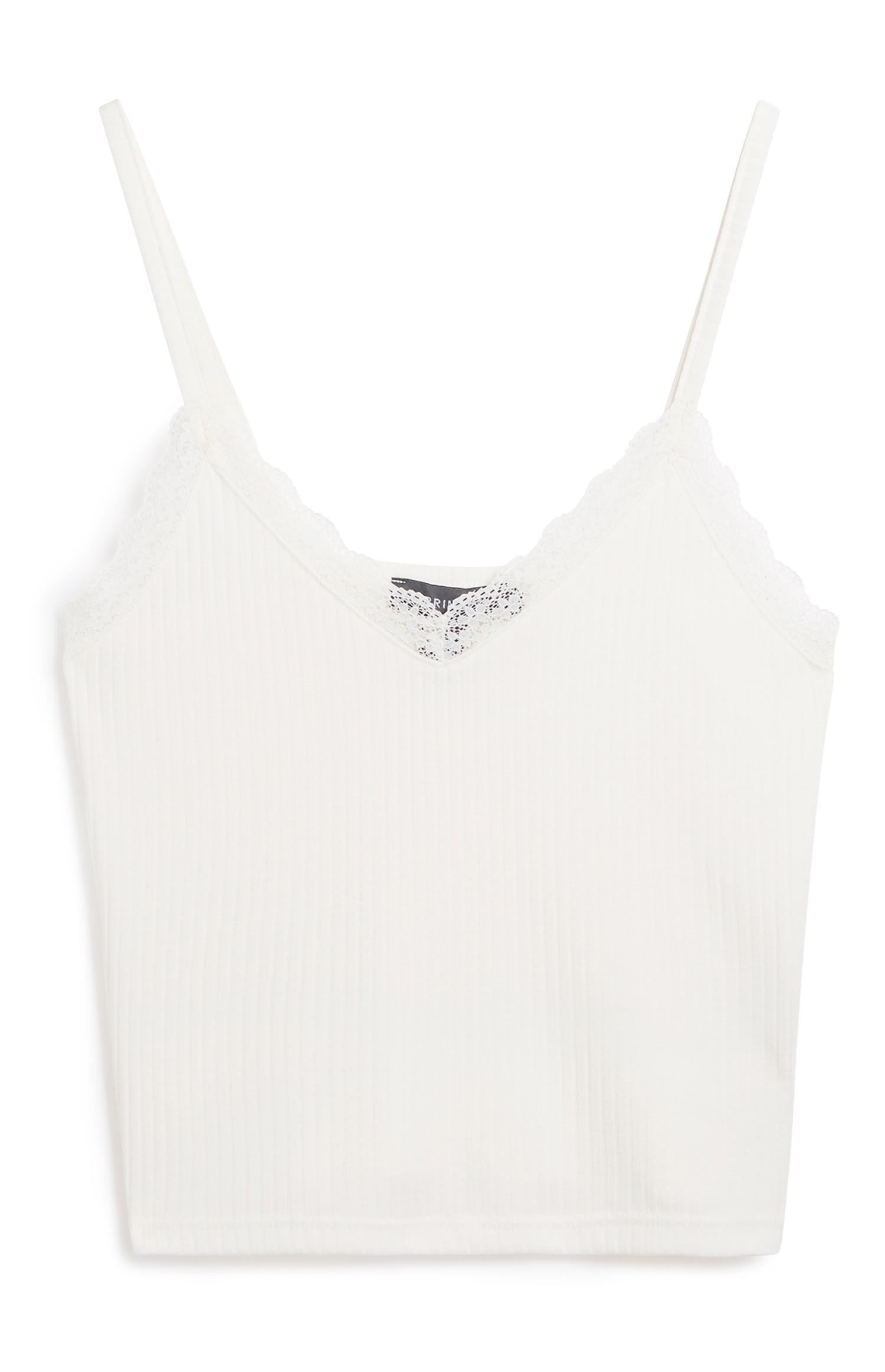 Caraco blanc à bordures en dentelle