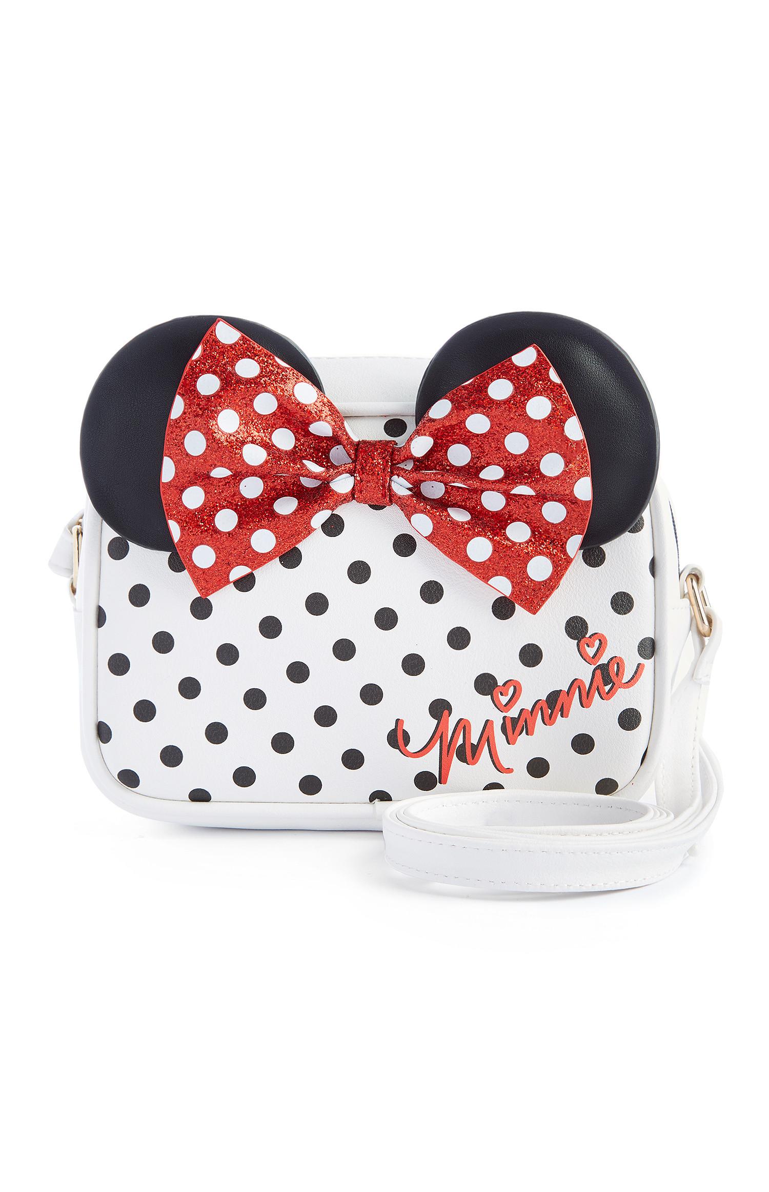 Bela pikčasta ročna torbica