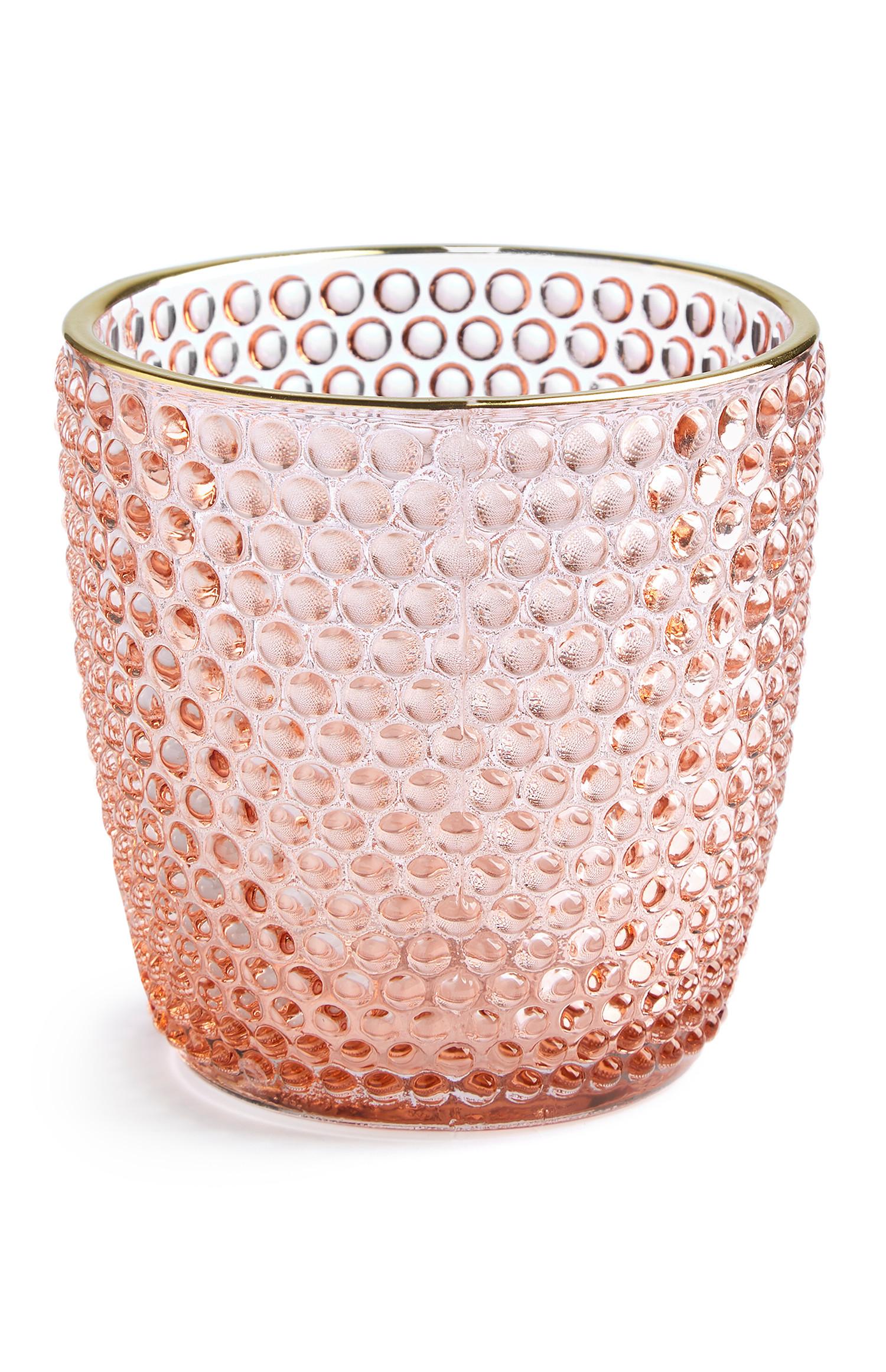 Portavelas rosa con relieve