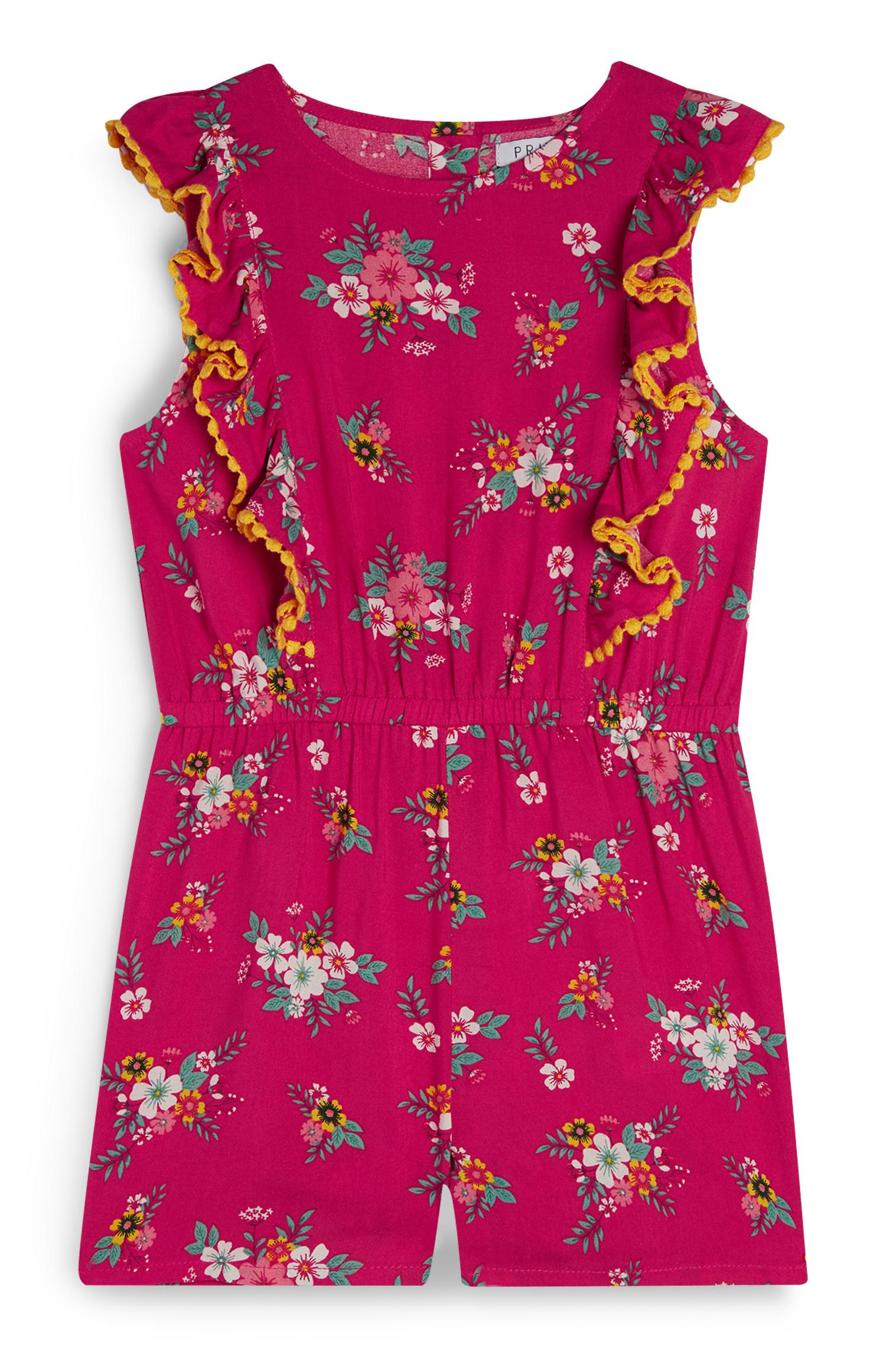 Enodelni rožnat hlačni kombinezon s cvetličnim vzorcem za deklice