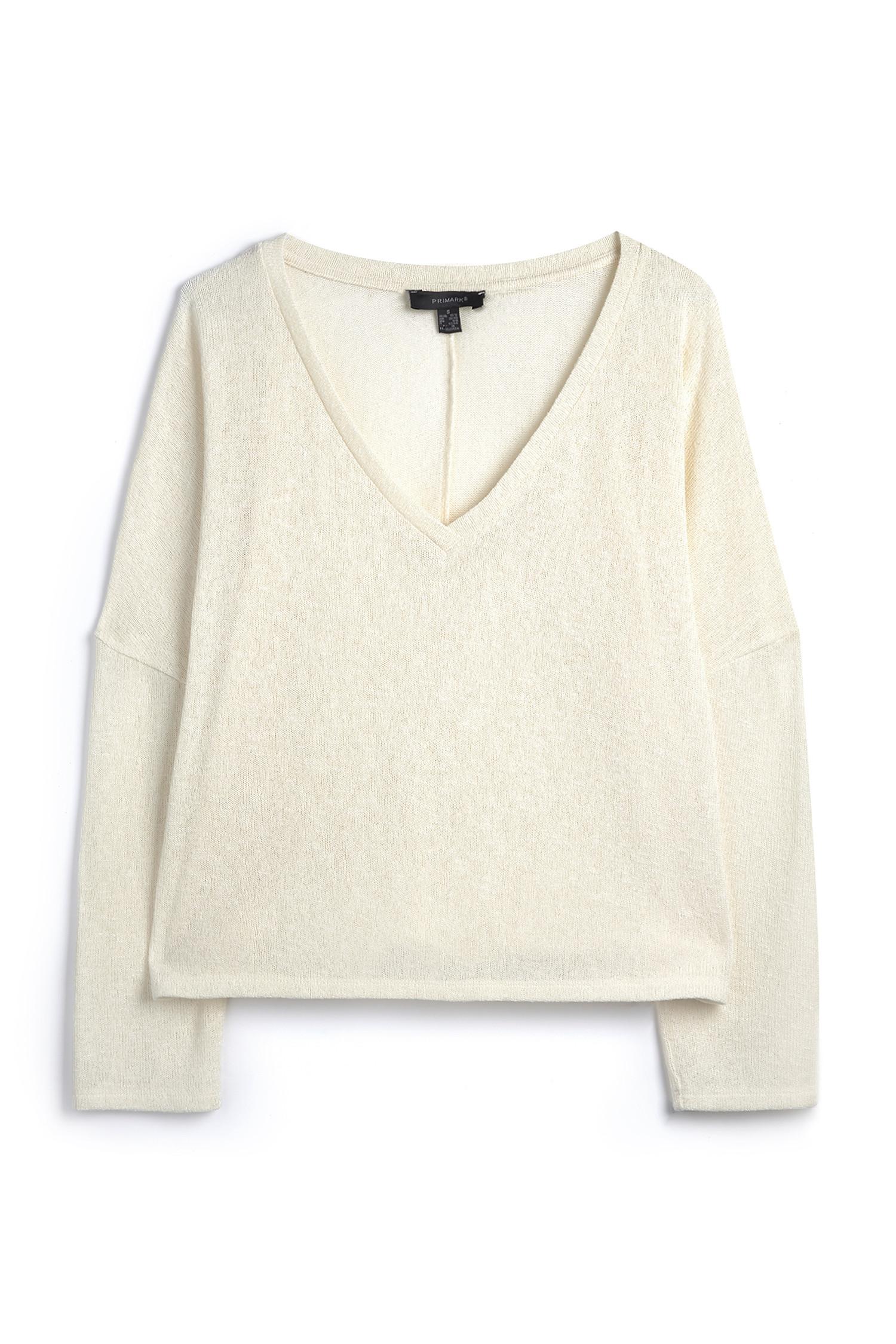 Pletena škatlasta majica z dolgimi rokavi in v-izrezom krem barve