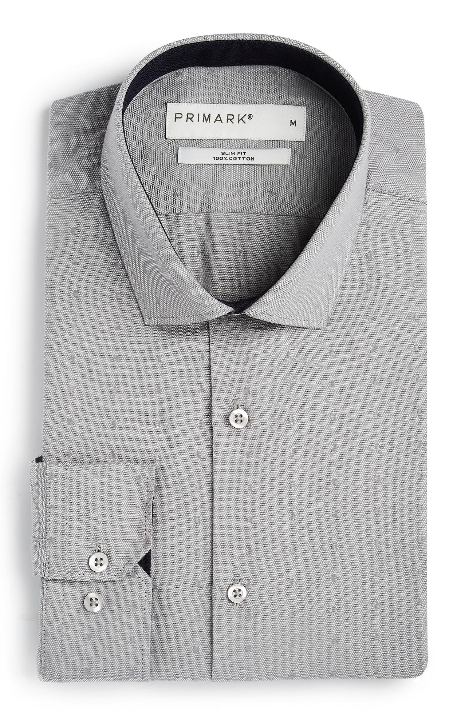 Oprijeta siva srajca s pikami iz bombaža