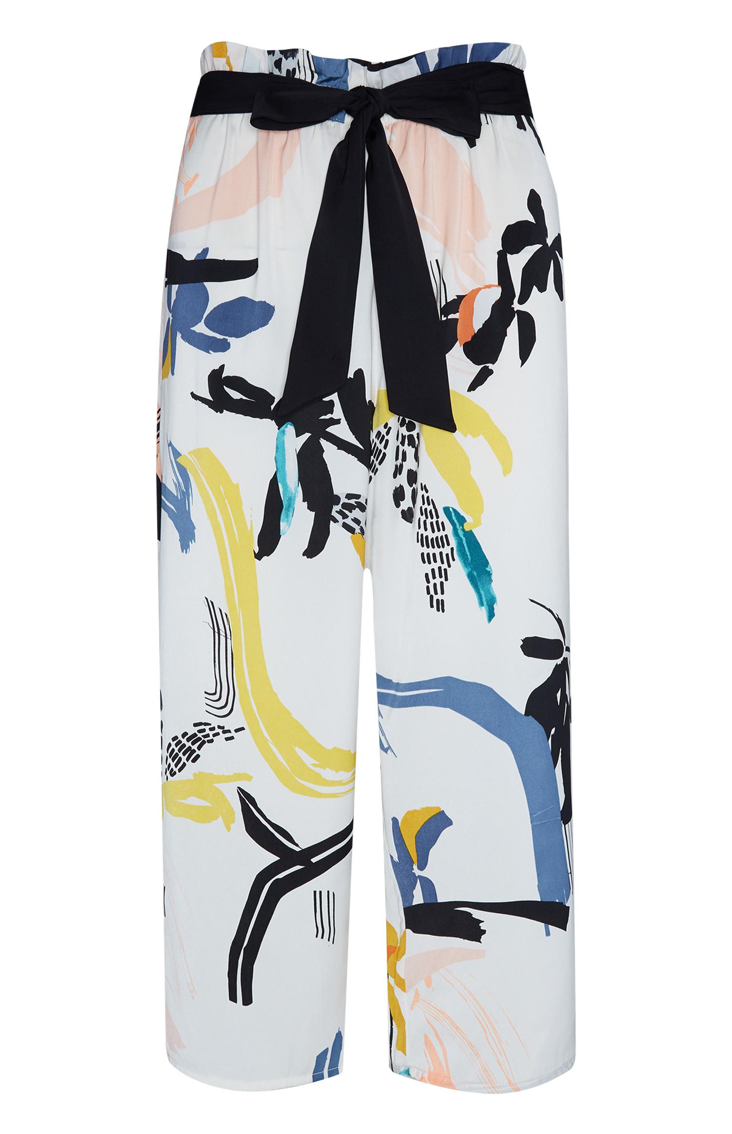 Pantalon ivoire en satin à imprimé peinture