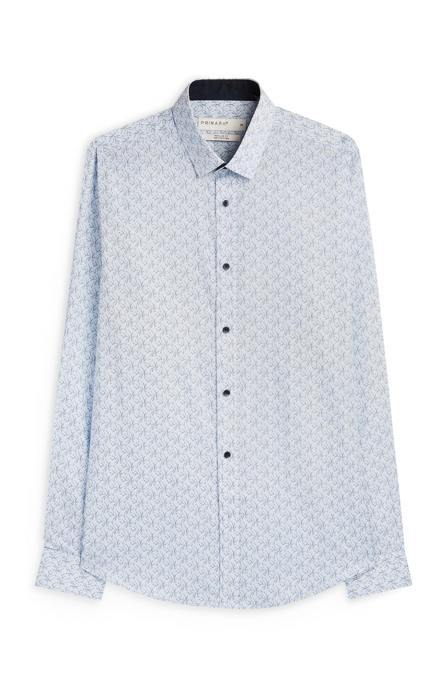 Oprijeta svetlo modra srajca s cvetličnim potiskom iz bombaža