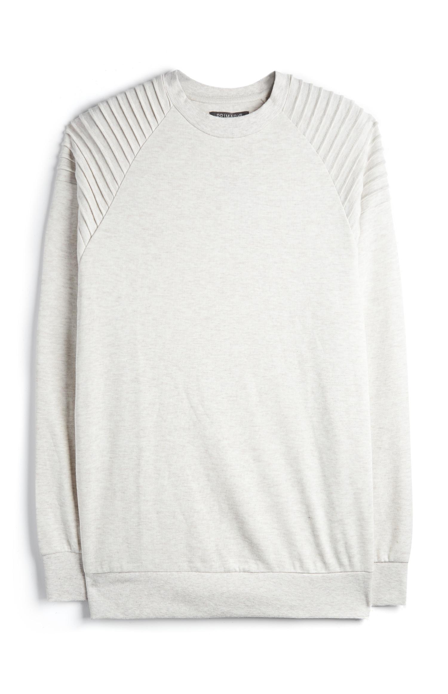 Pull écru à col ras-du-cou et épaules style motard