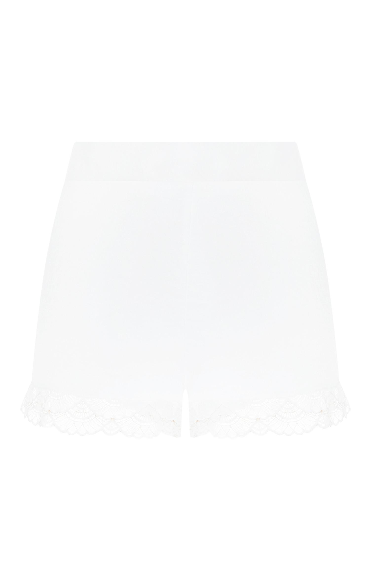 Short ivoire en satin à volants