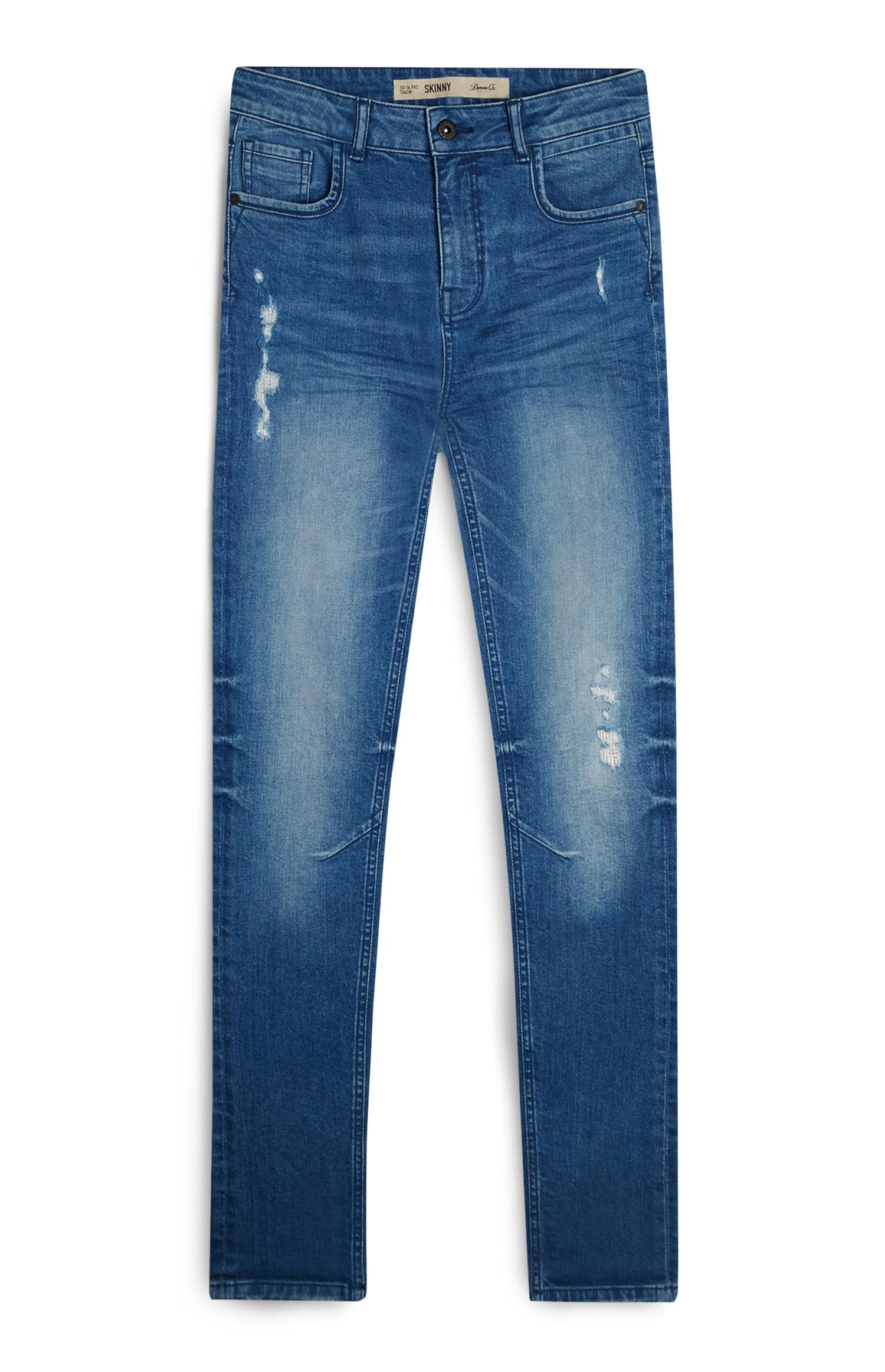 Jeans blu strappati e sfumati da ragazzo