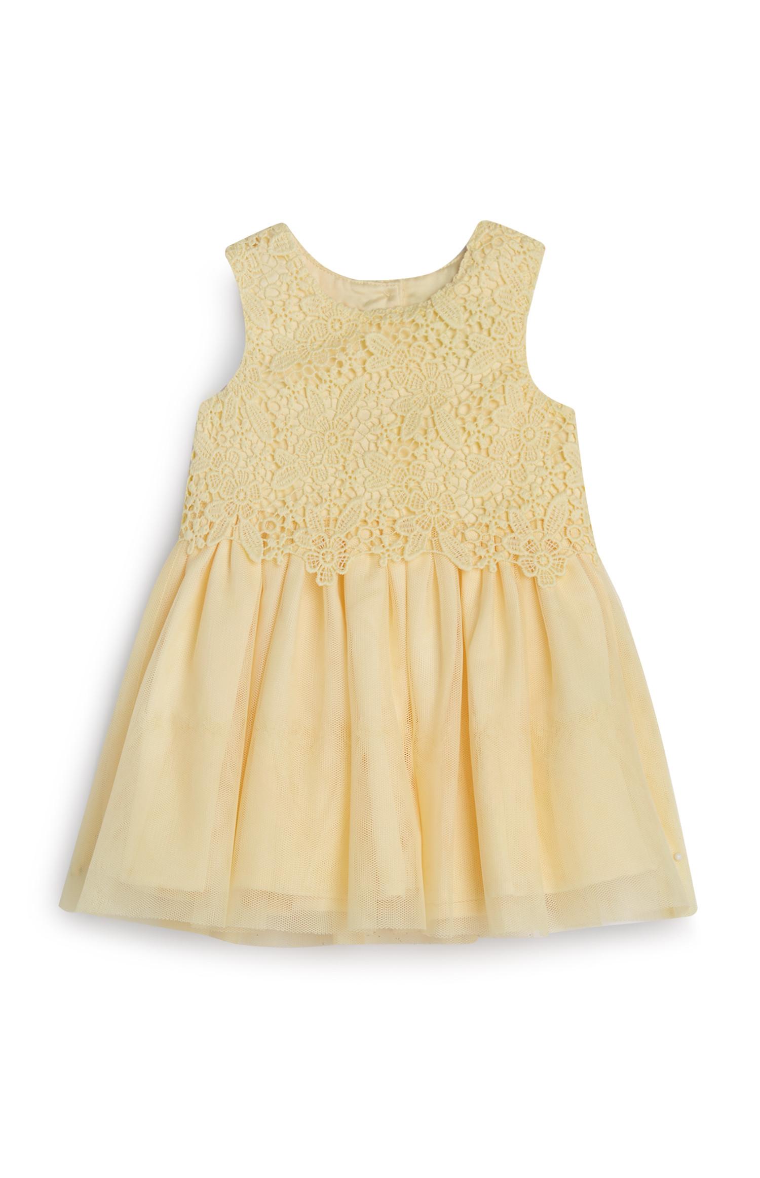 Abito giallo in pizzo e mesh da bimba