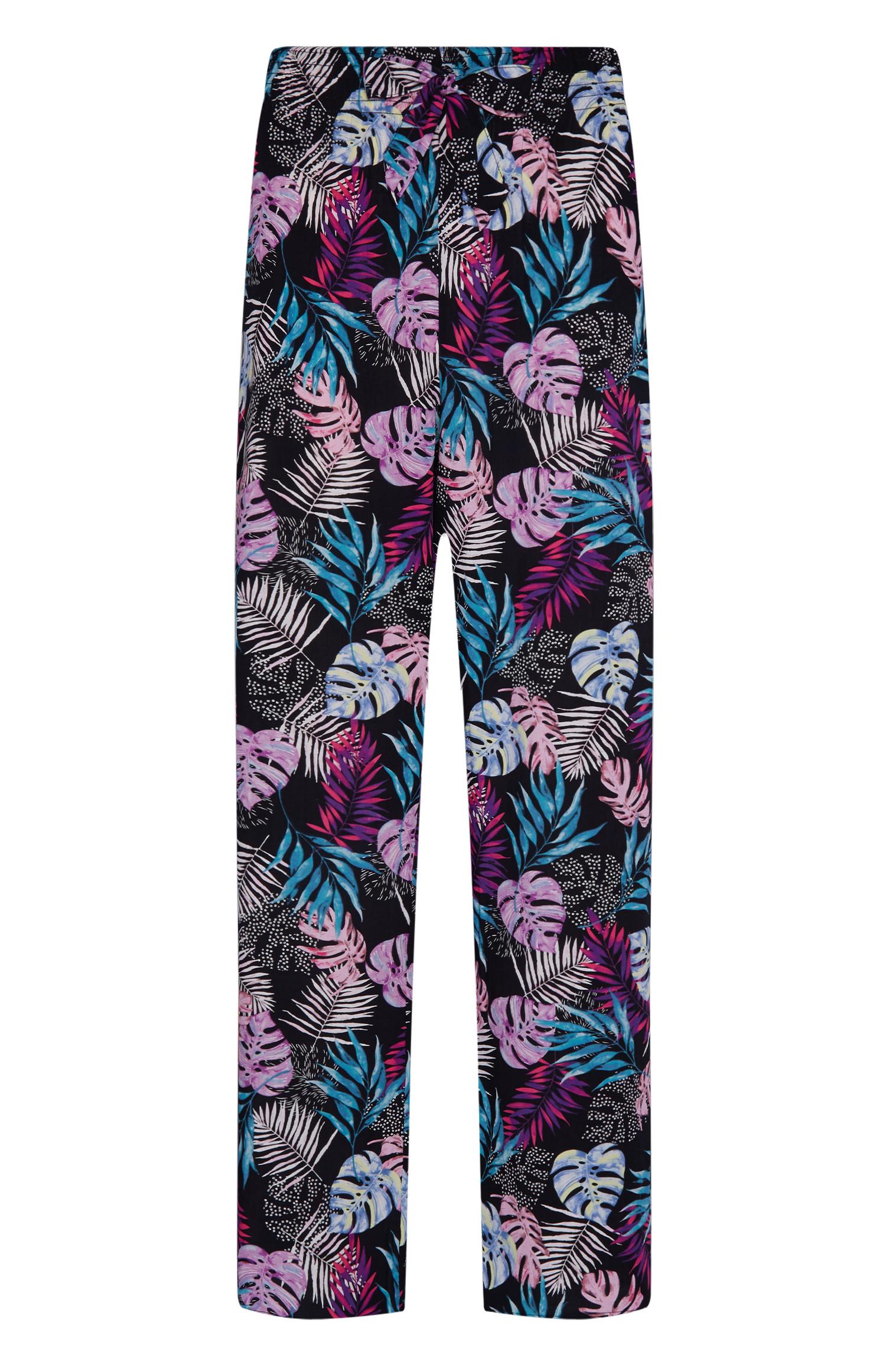 Pantalon de pyjama large noir en viscose à imprimé feuilles