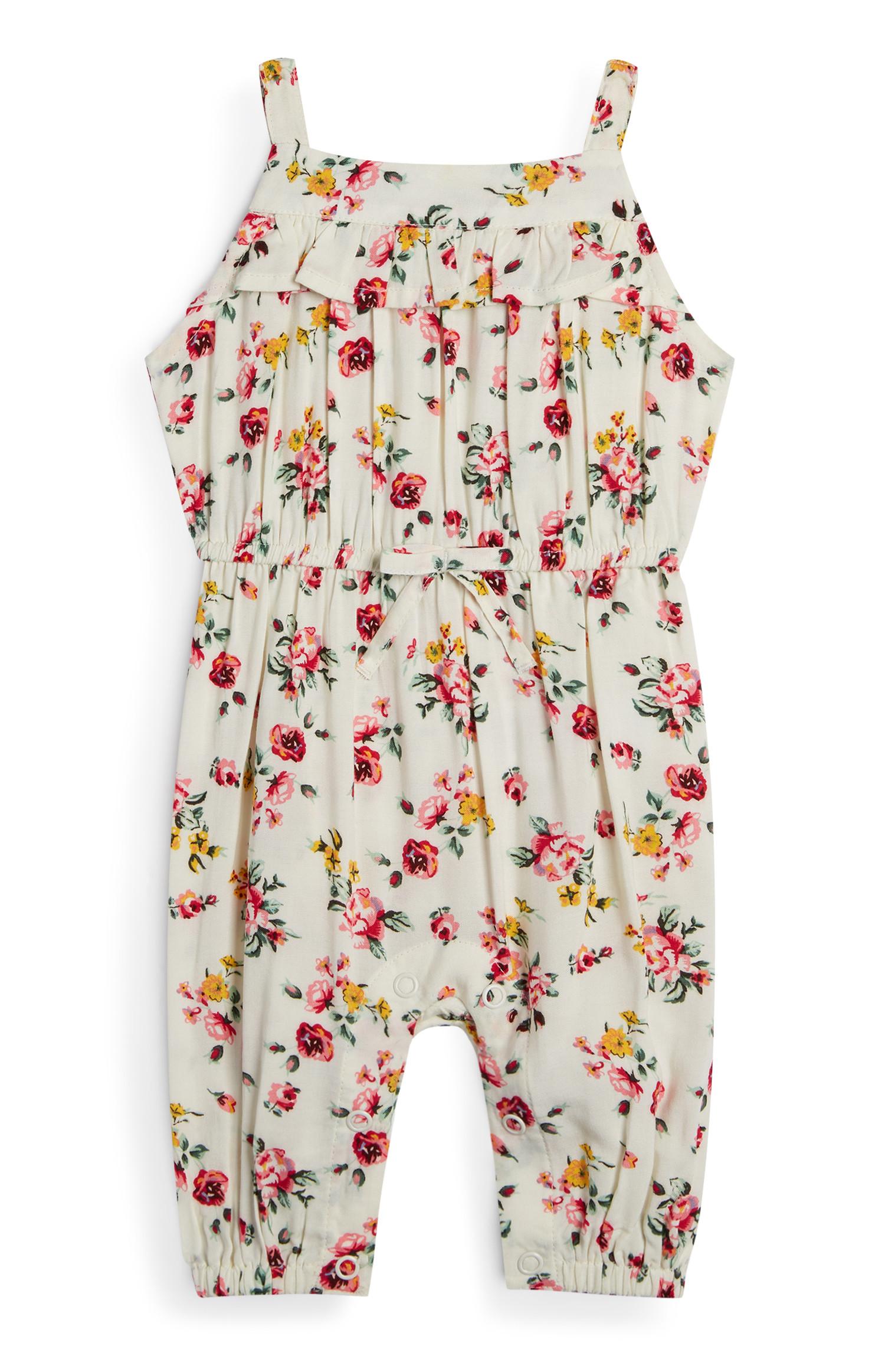 Dekliški slonokoščeno bel kombinezon s cvetličnim vzorcem za dojenčke