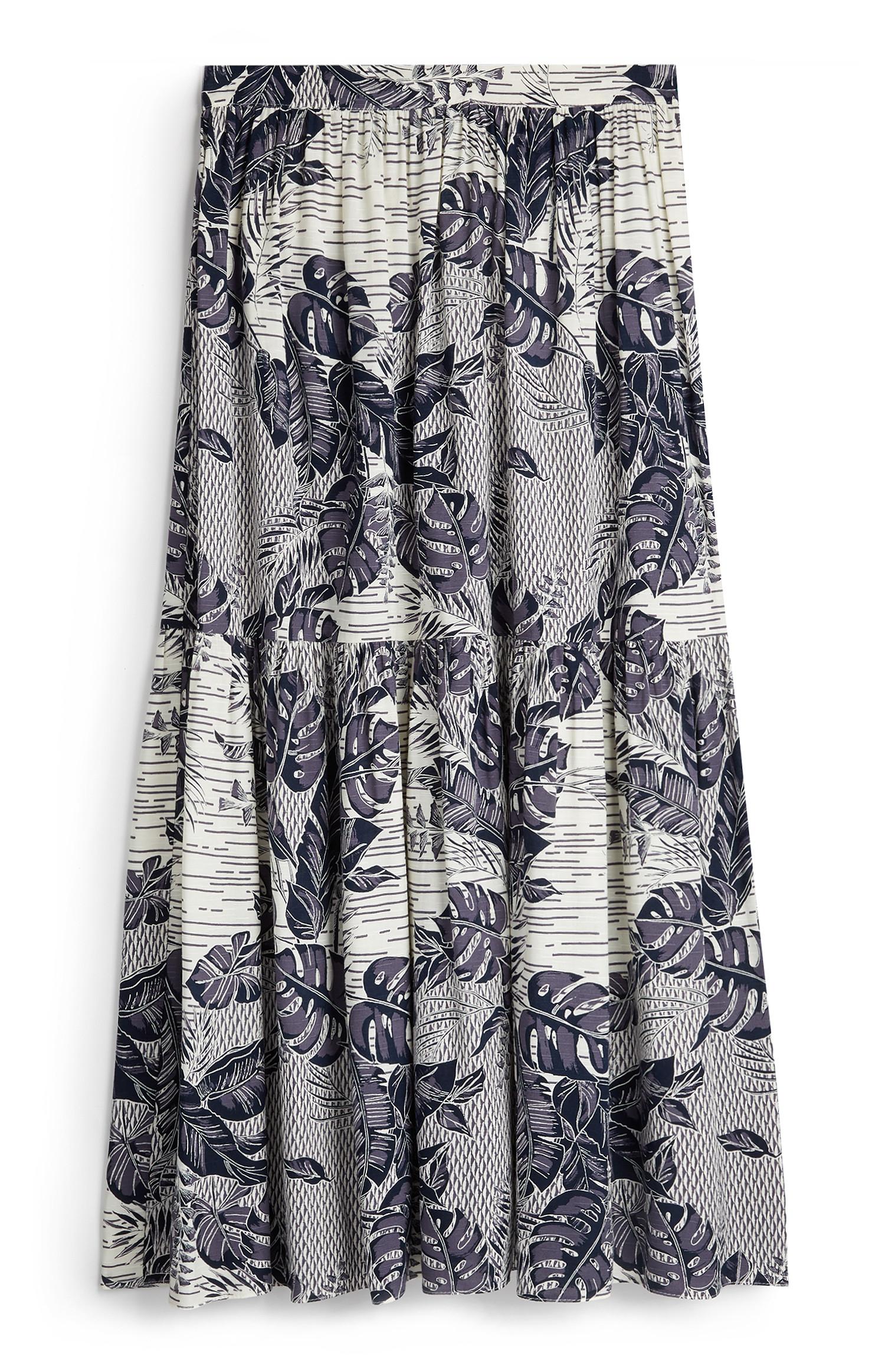 Jupe mi-longue bleu marine à superpositions et imprimé feuilles