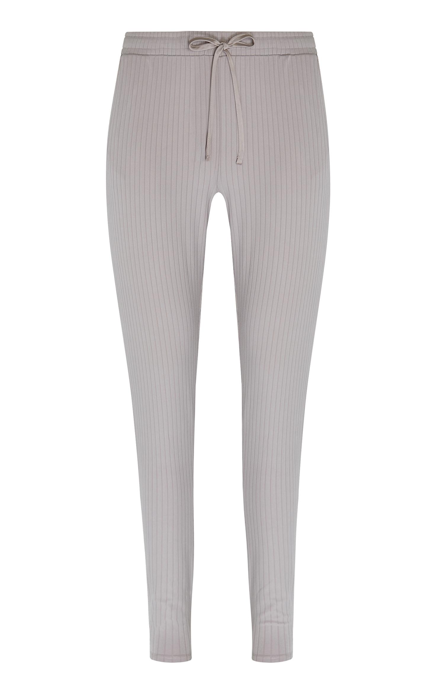 Bas de jogging gris fabriqué à partir de matériaux recyclés