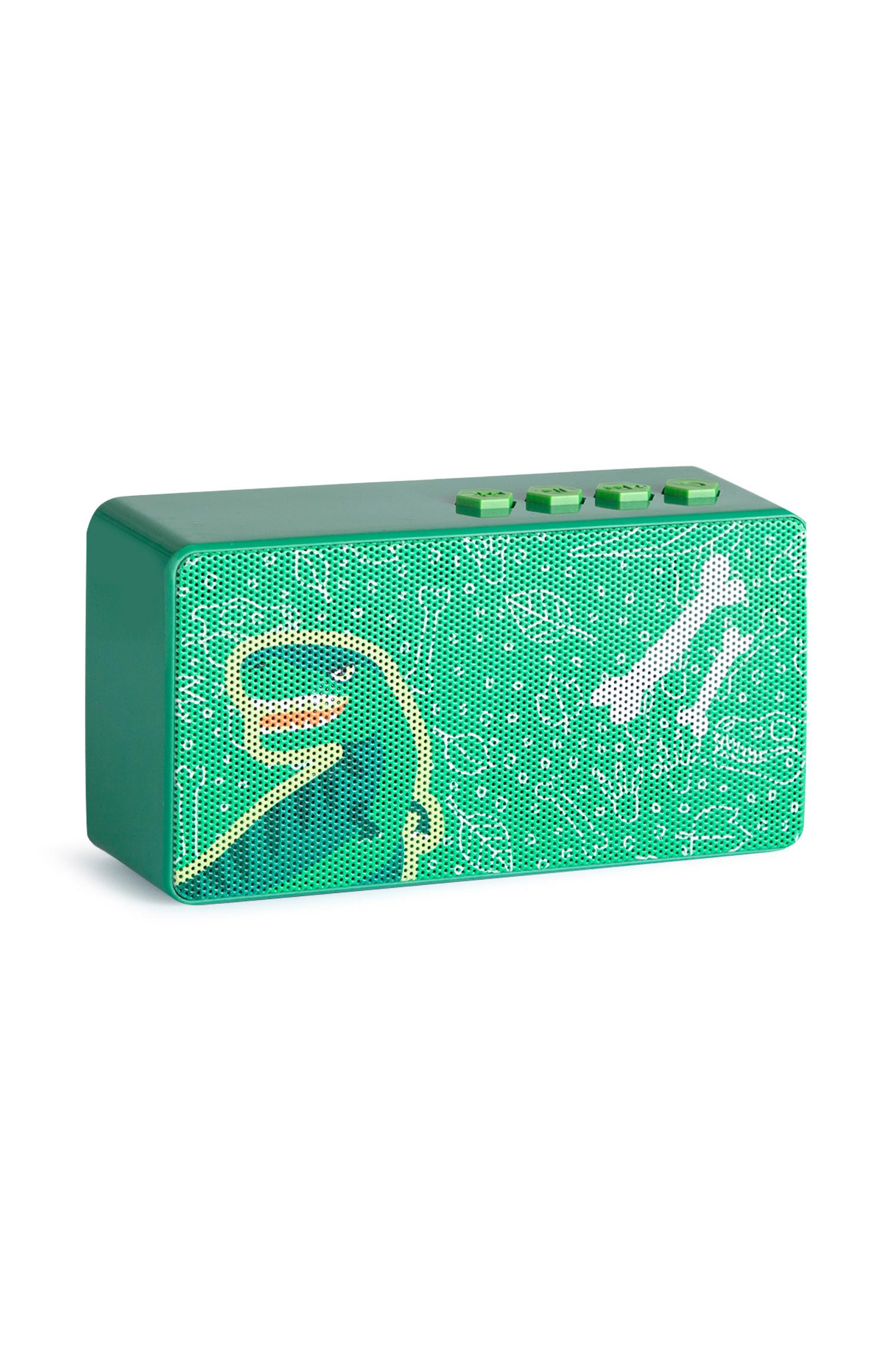 Kabelloser, grüner Lautsprecher mit Dino-Print