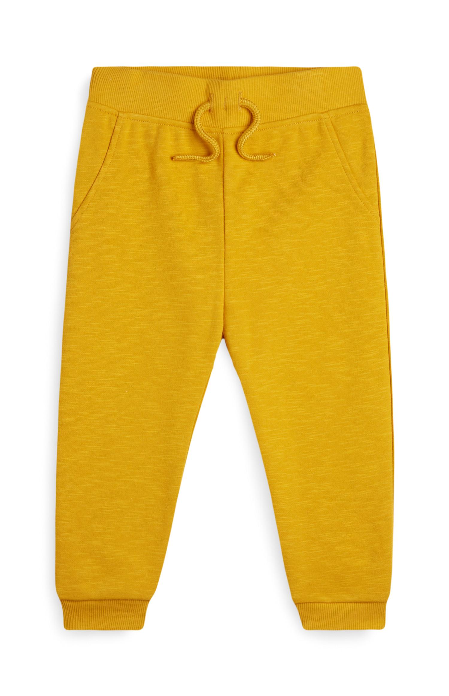 Fantovske rumene športne hlače za dojenčke