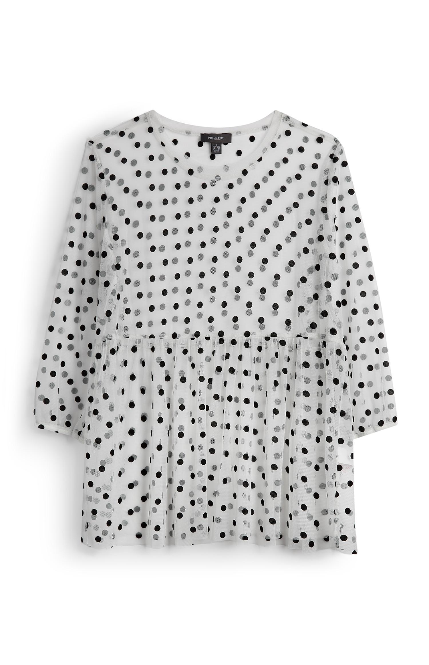 T-shirt blanc à pois et volants