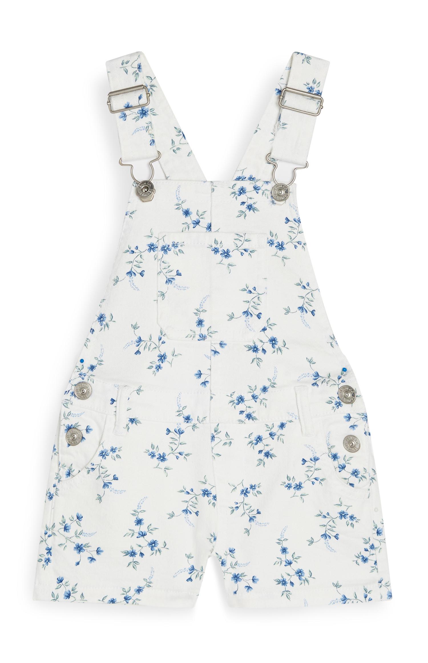 Salopette floreale da bambina