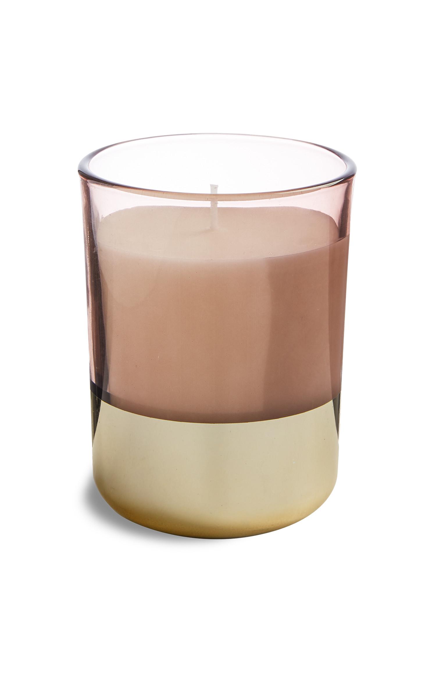 Sveča v rožnatem kozarcu s pozlačenim dnom