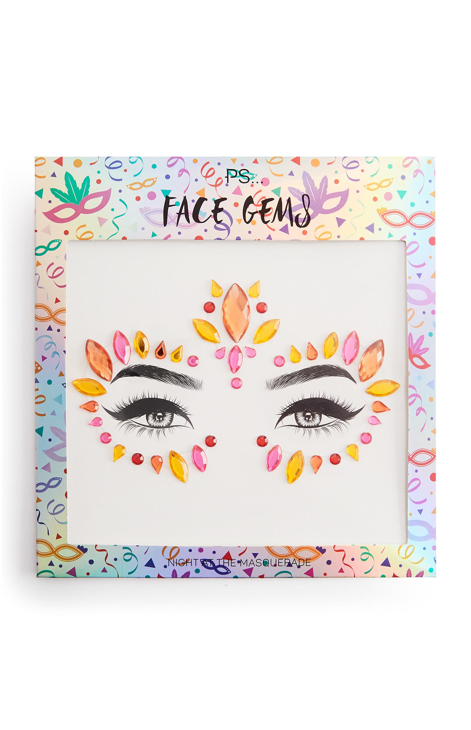 Rožnati in oranžni okrasni kamenčki za obraz