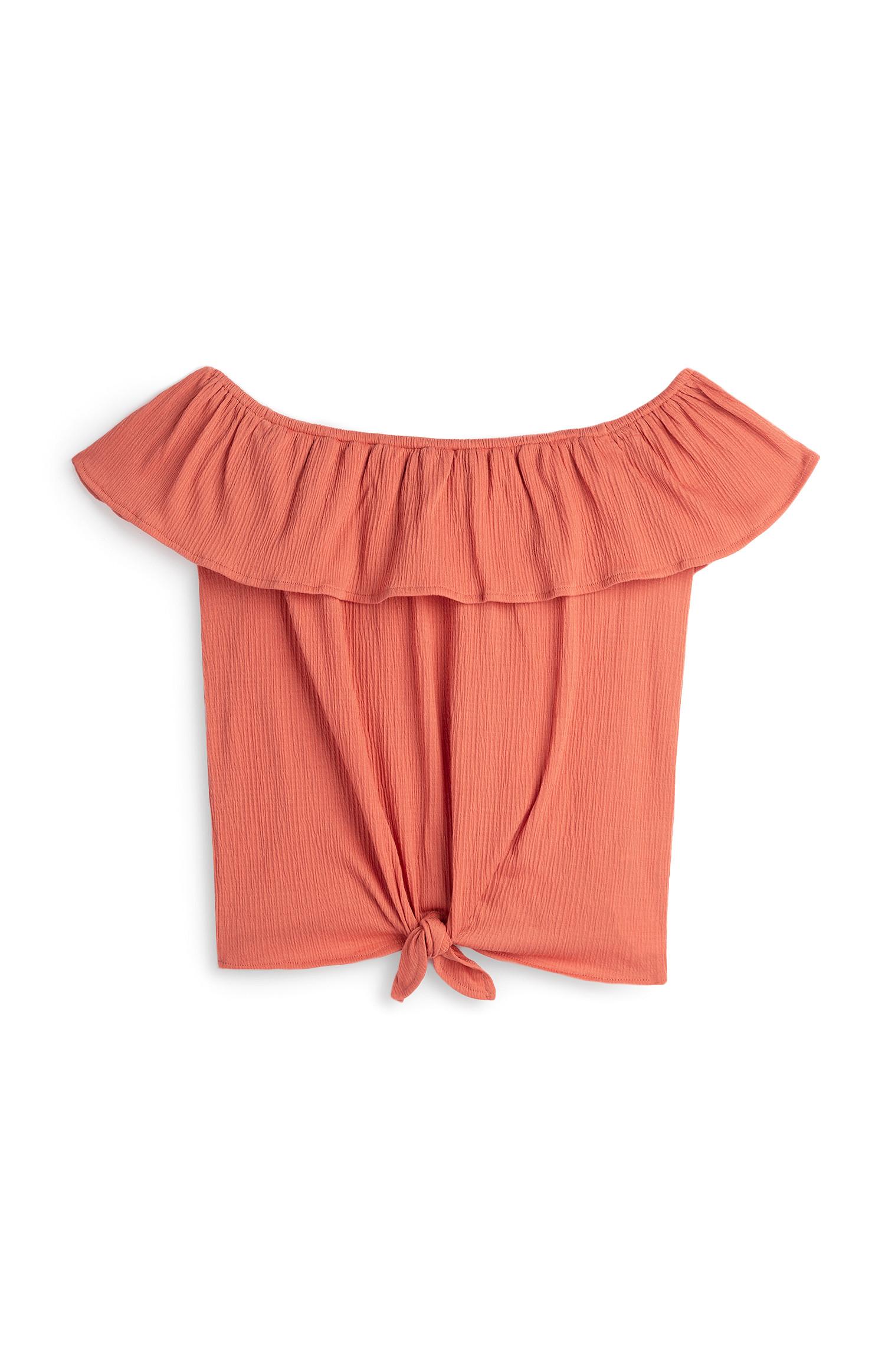 Top color pesca stile Bardot annodato sul davanti da ragazza