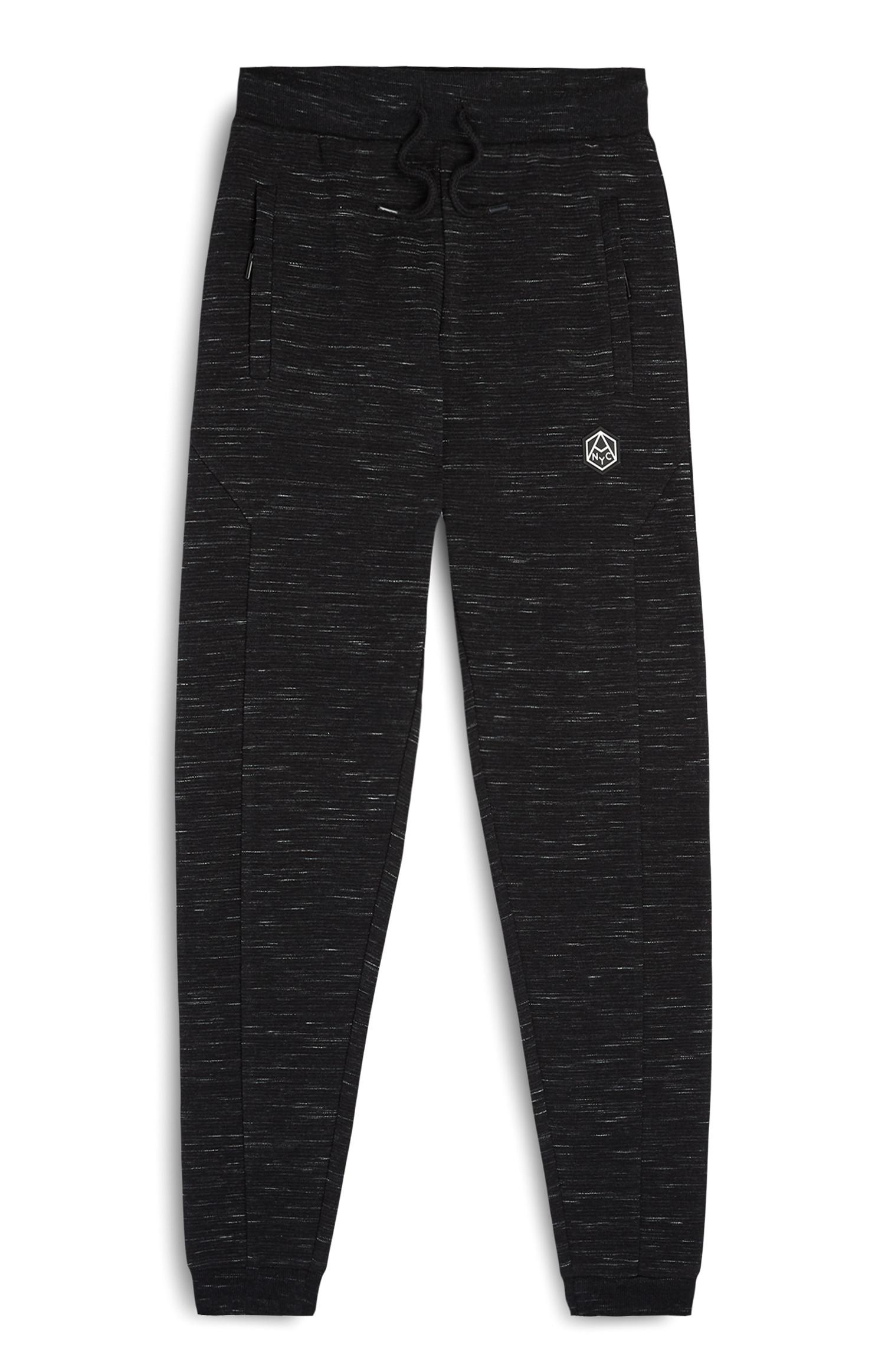 Joggers neri a coste da ragazzo