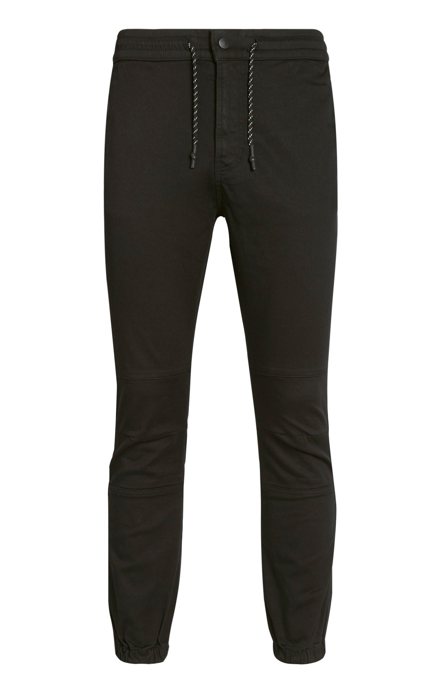 Pantalon kaki resserré à la cheville