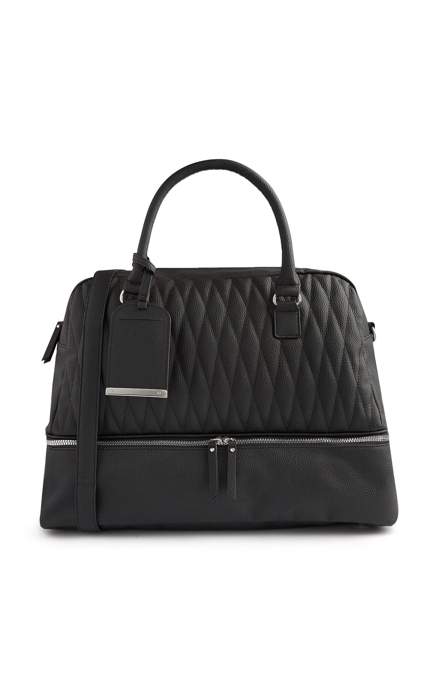 Sac noir matelassé avec compartiment zippé