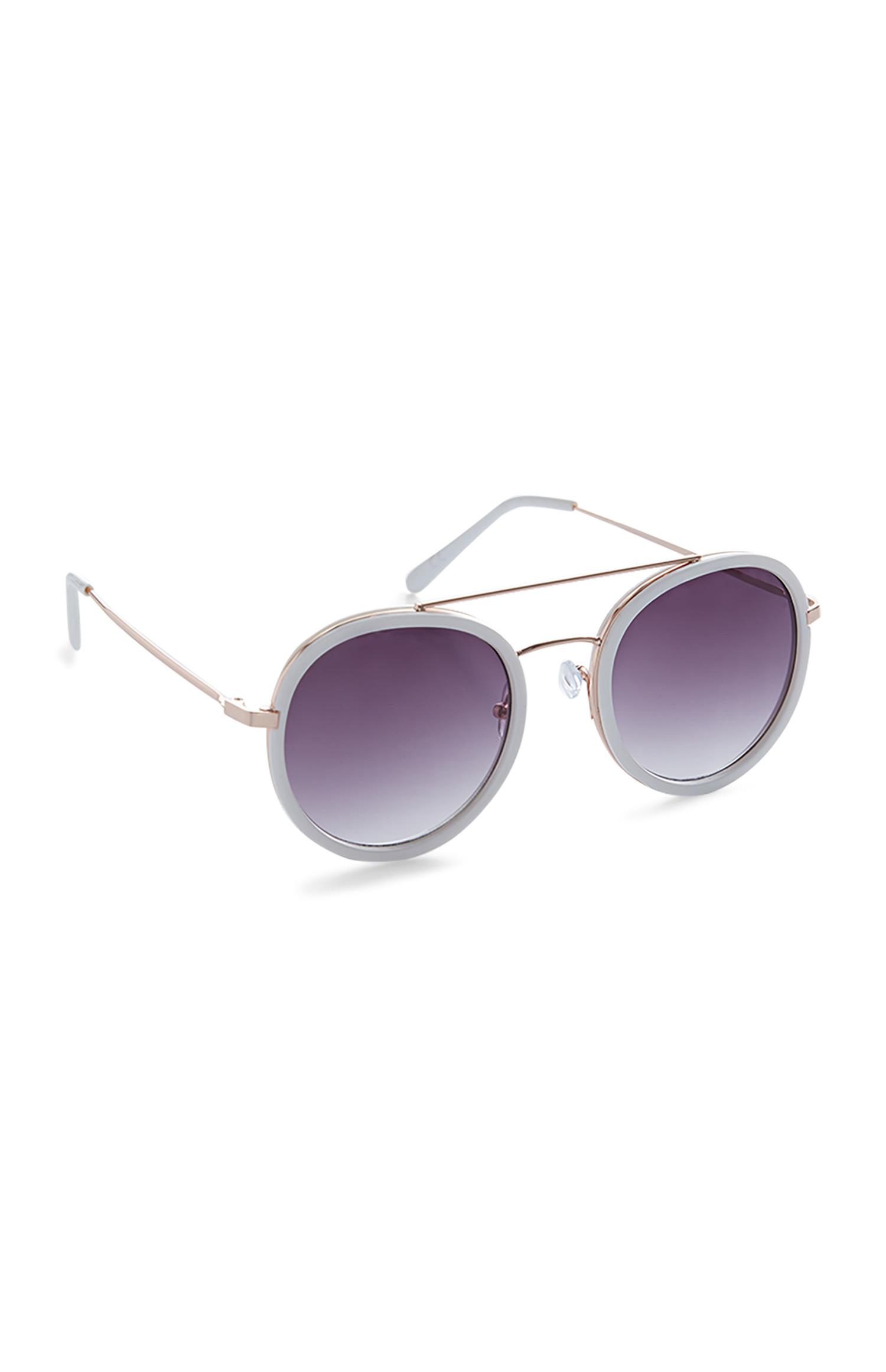 Lunettes de soleil rondes violettes à dégradé avec barre marron