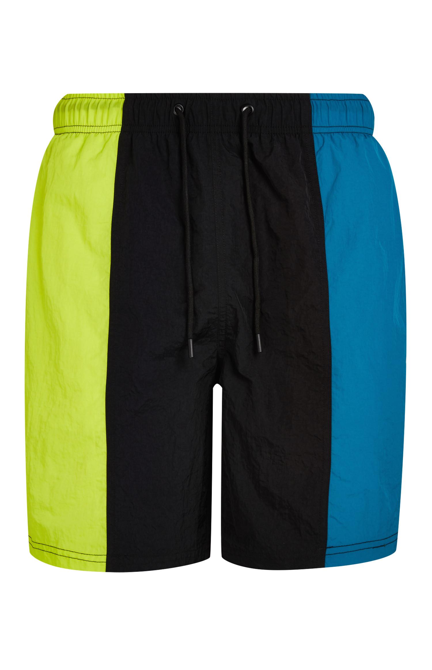 Calções banho blocos cor verticais preto, verde e azul