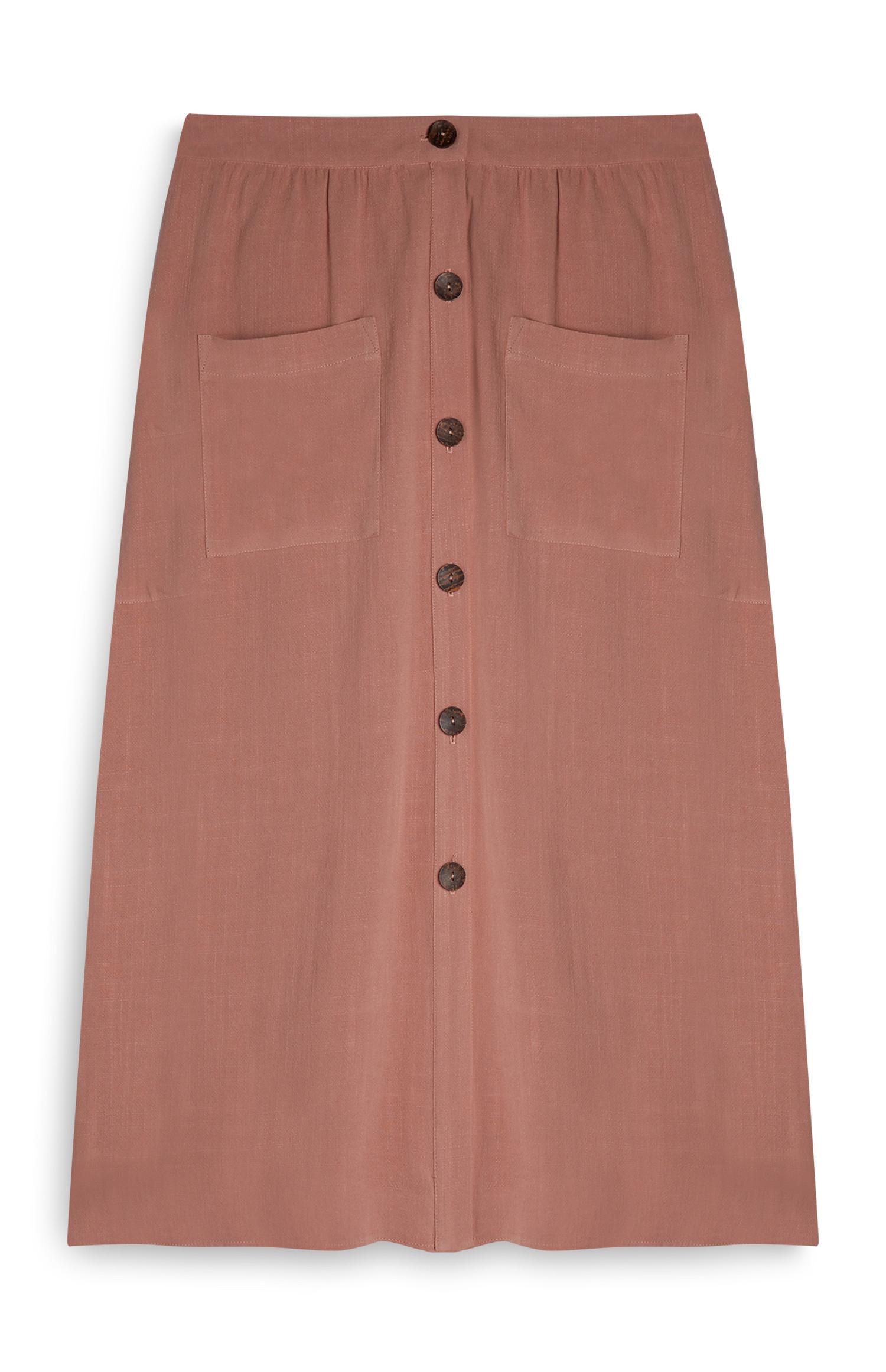 Jupe mi-longue rose boutonnée à poches sur le devant