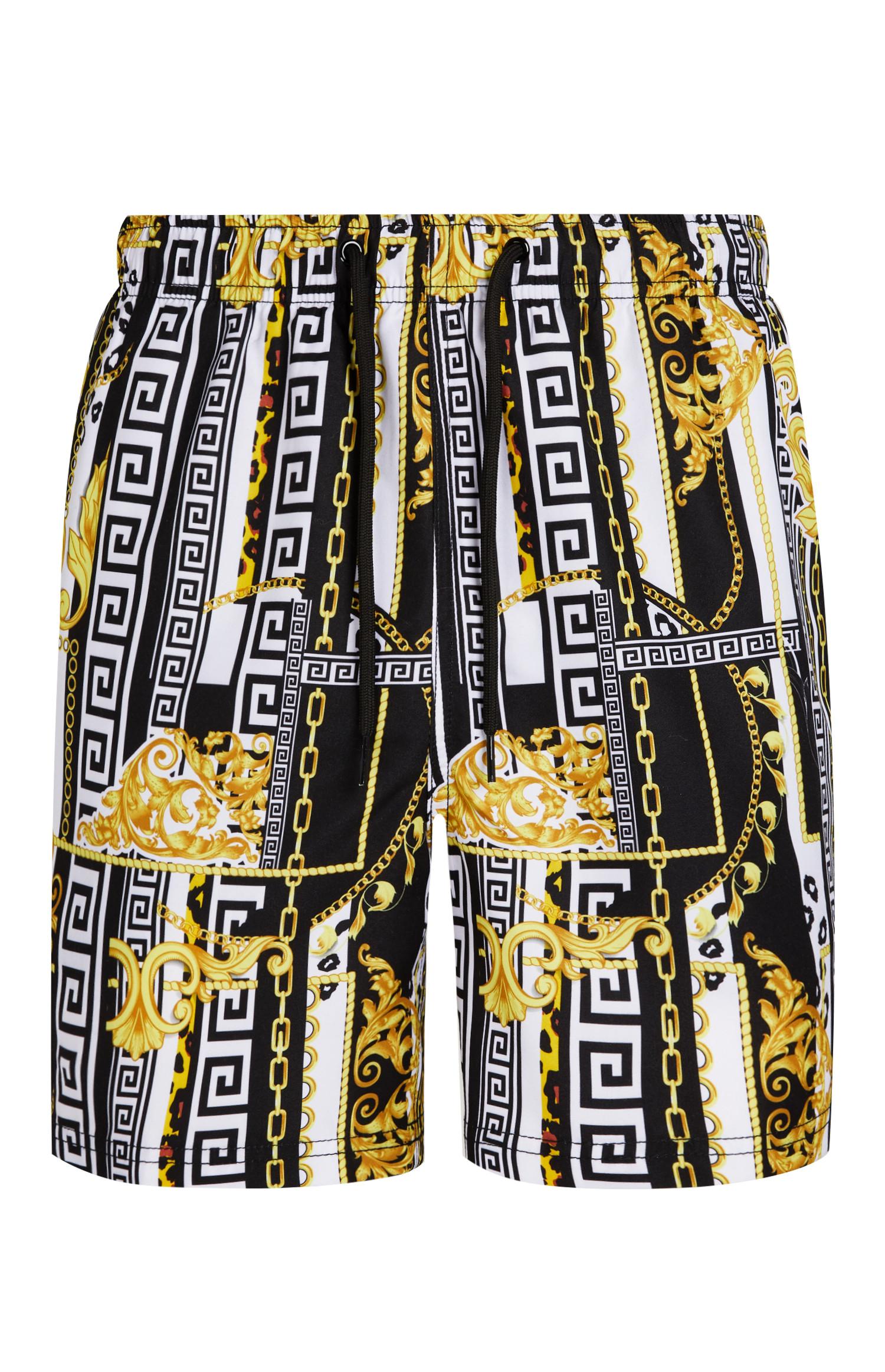 Calções banho padrão barroco preto e dourado