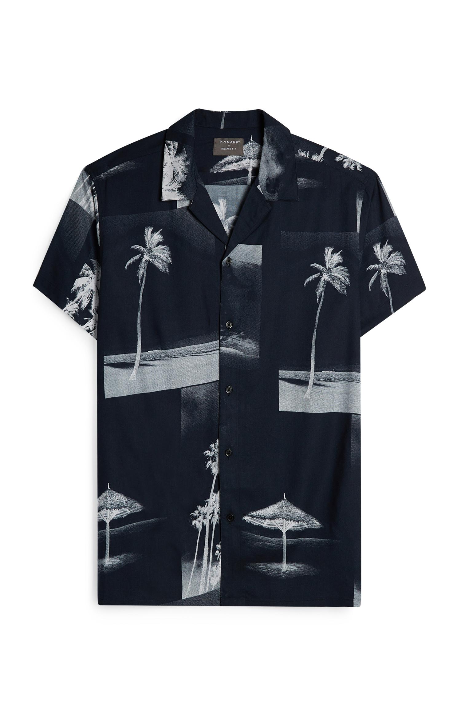 Chemise boutonnée noire à imprimé palmiers