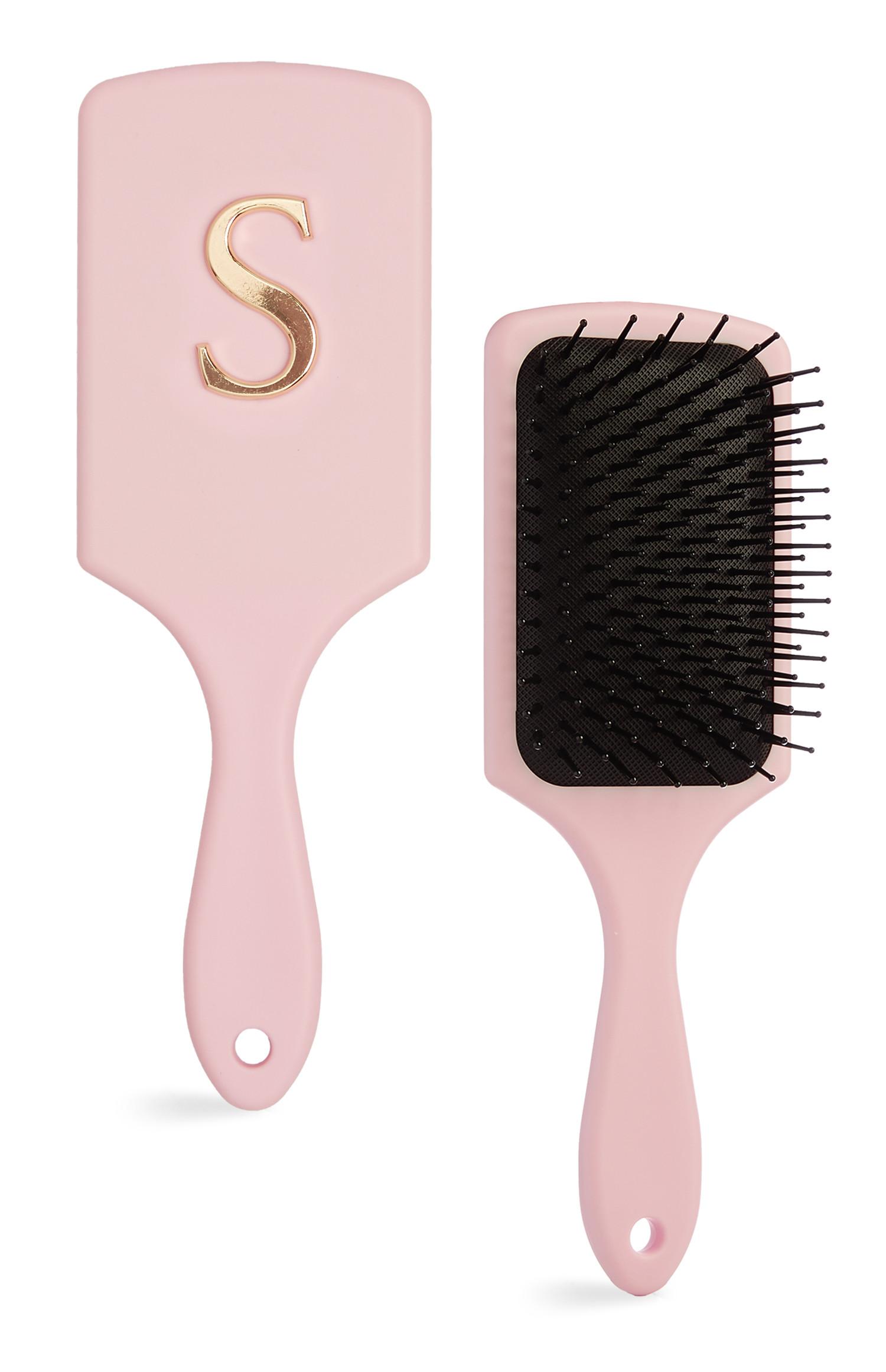 Brede roze haarborstel met letter S