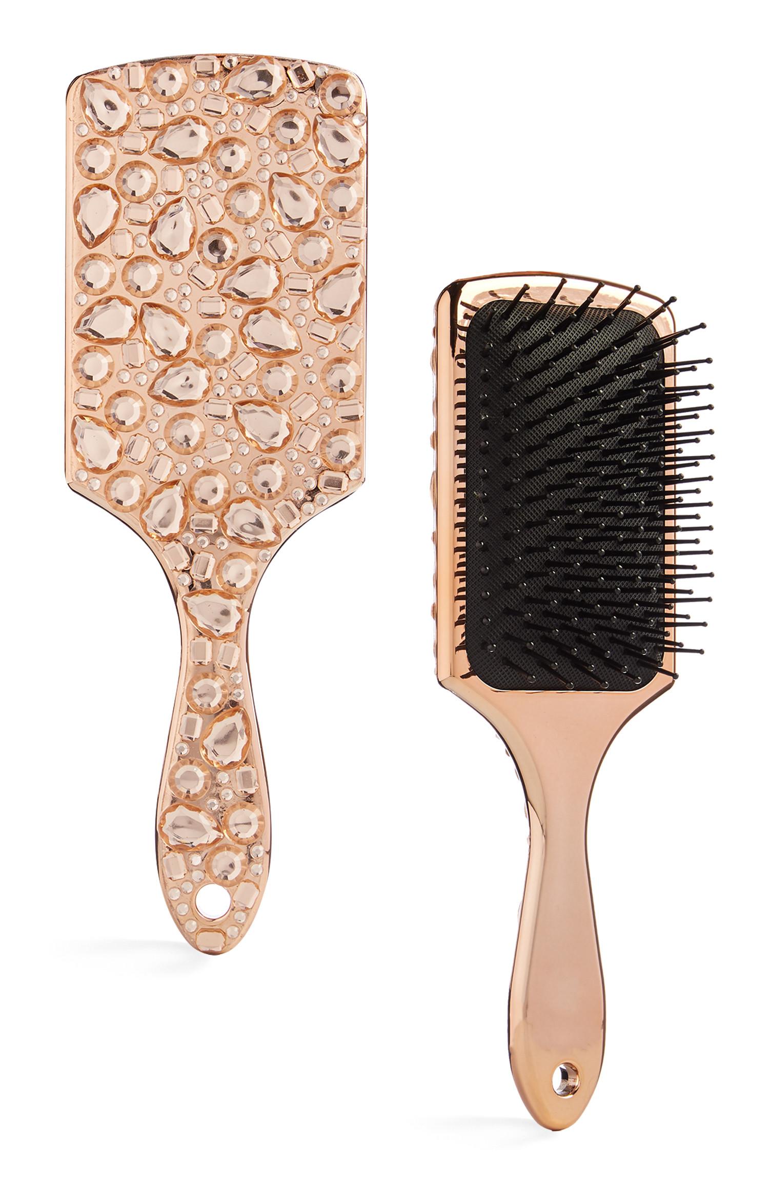 Brosse plate rose doré incrustée de bijoux