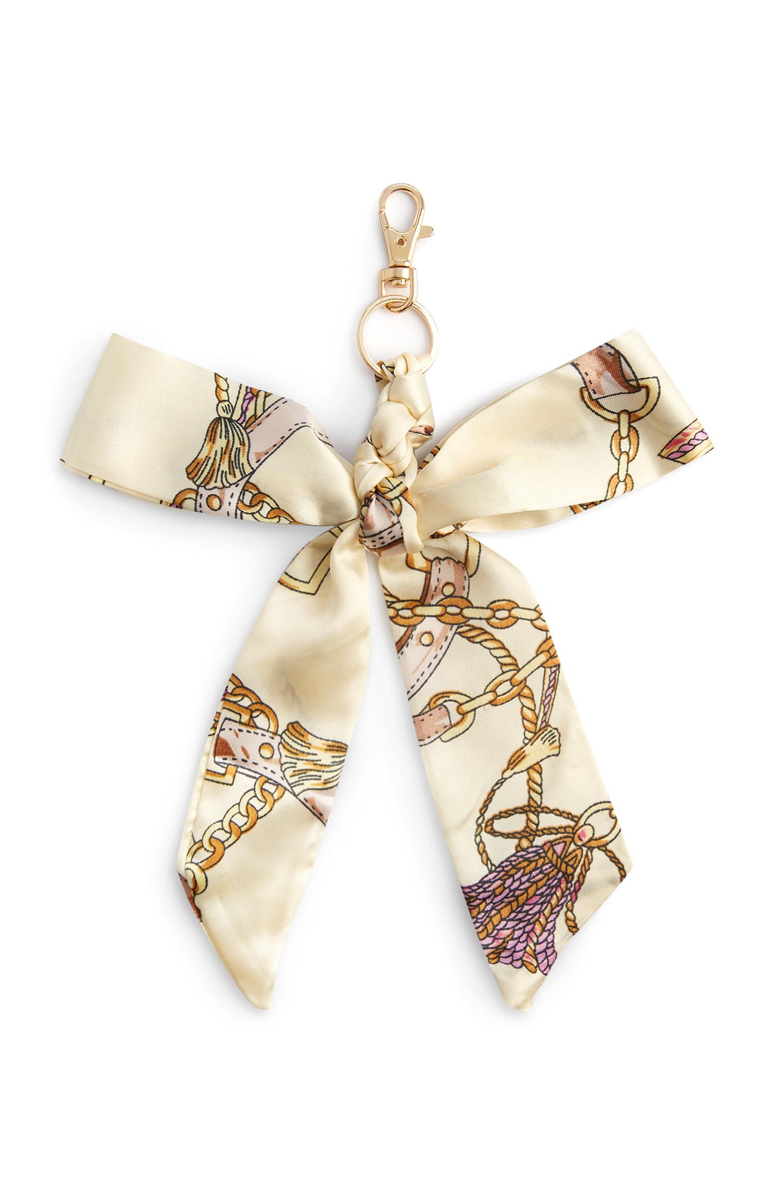 Acessório porta-chaves estampado corrente creme