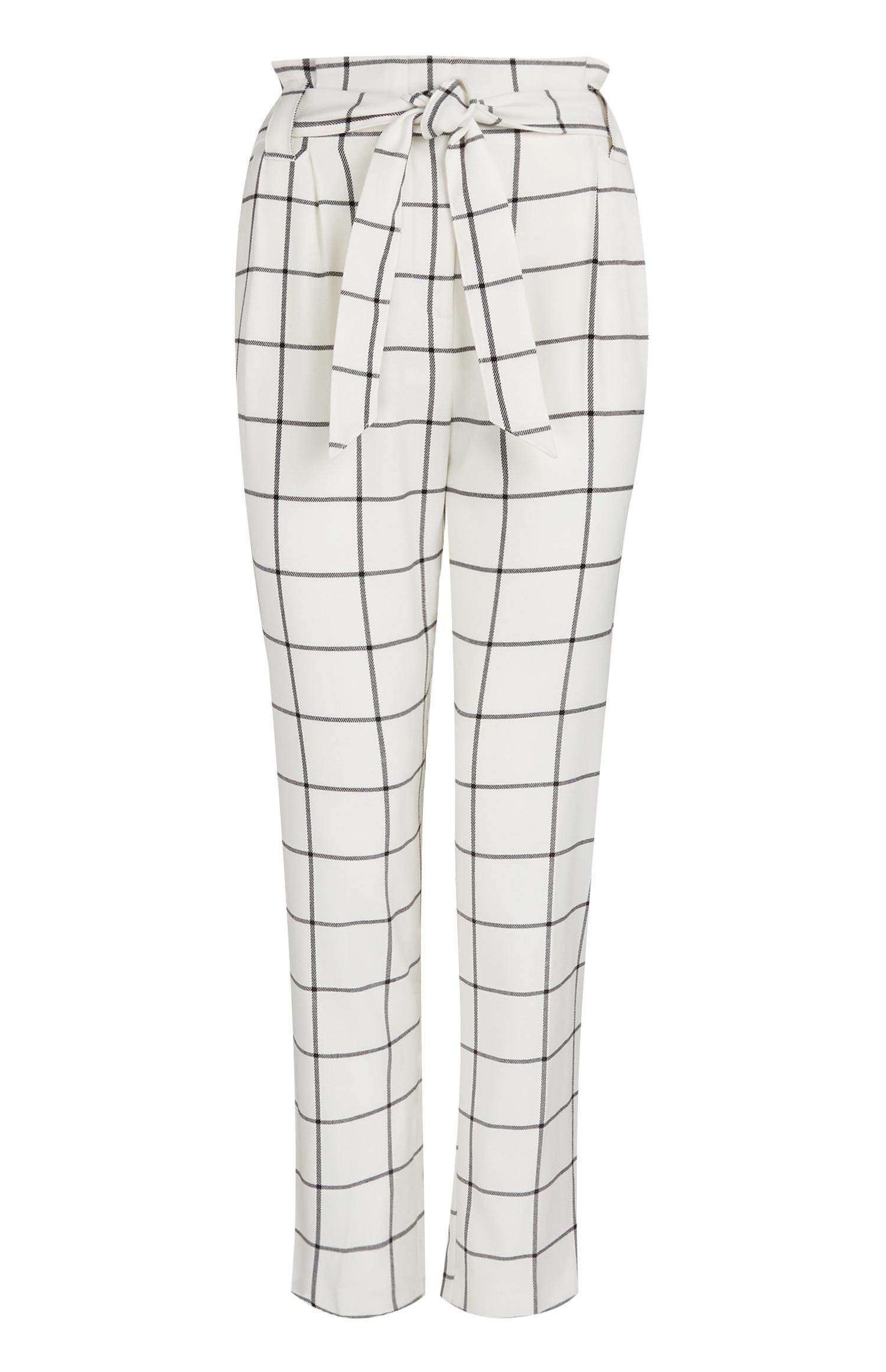 Calças paperbag xadrez branco e preto