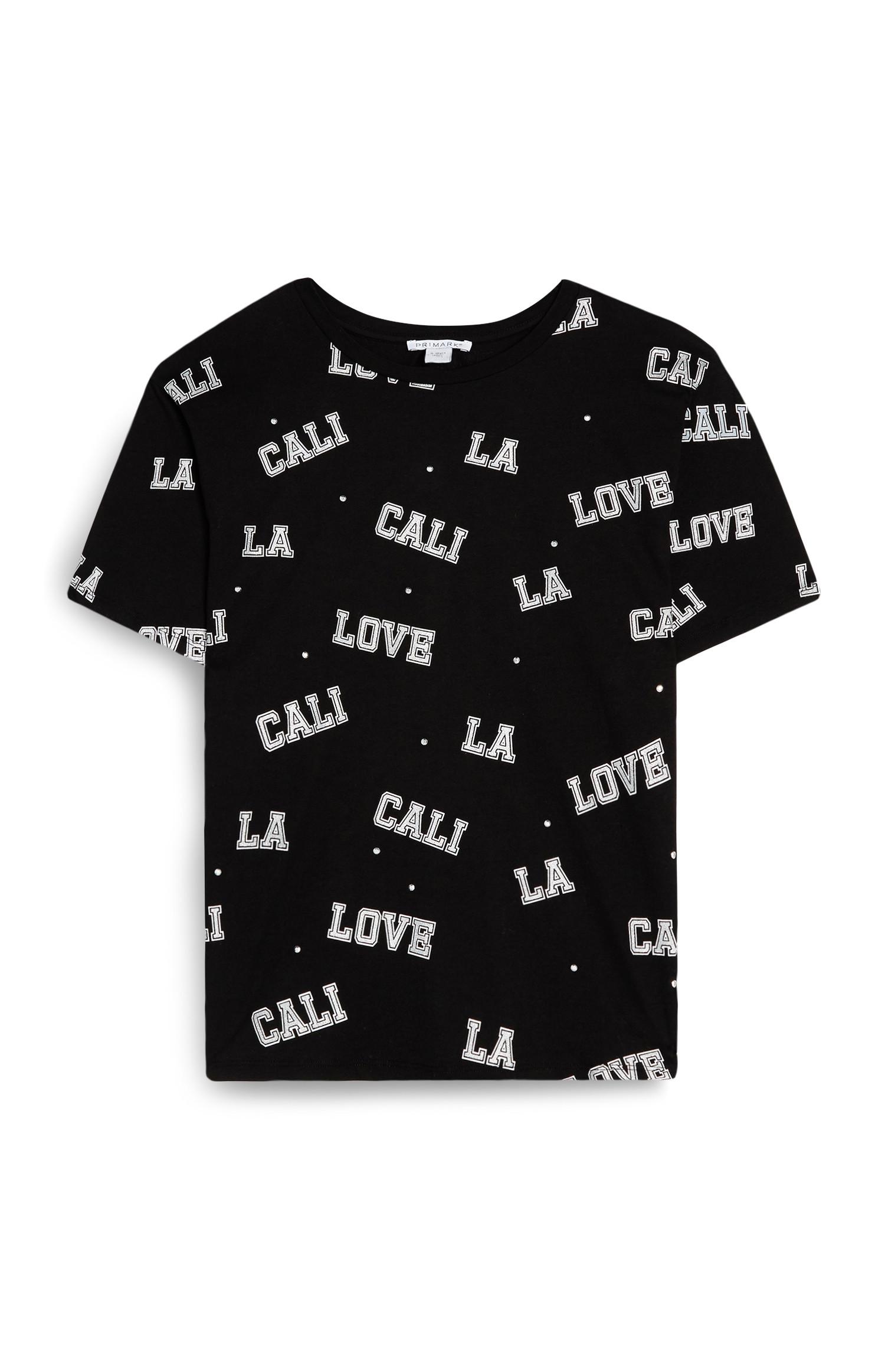 T-shirt con scritta e strass da ragazza