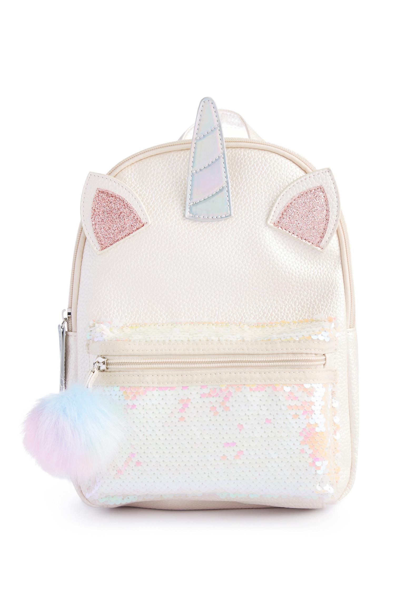 Bel nahrbtnik z bleščicami in samorogom