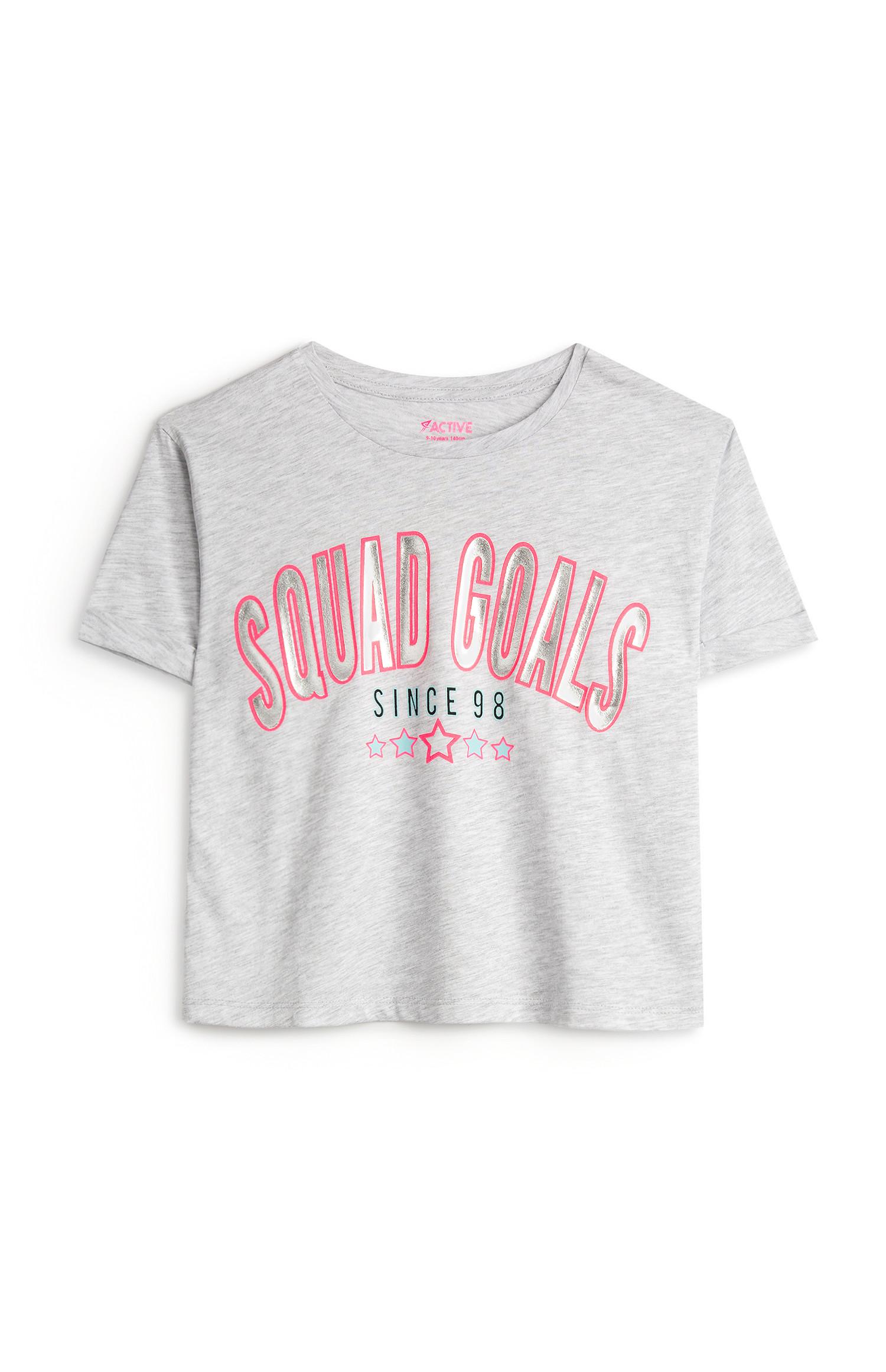 T-shirt grigia con scritta Squad Goals da ragazza